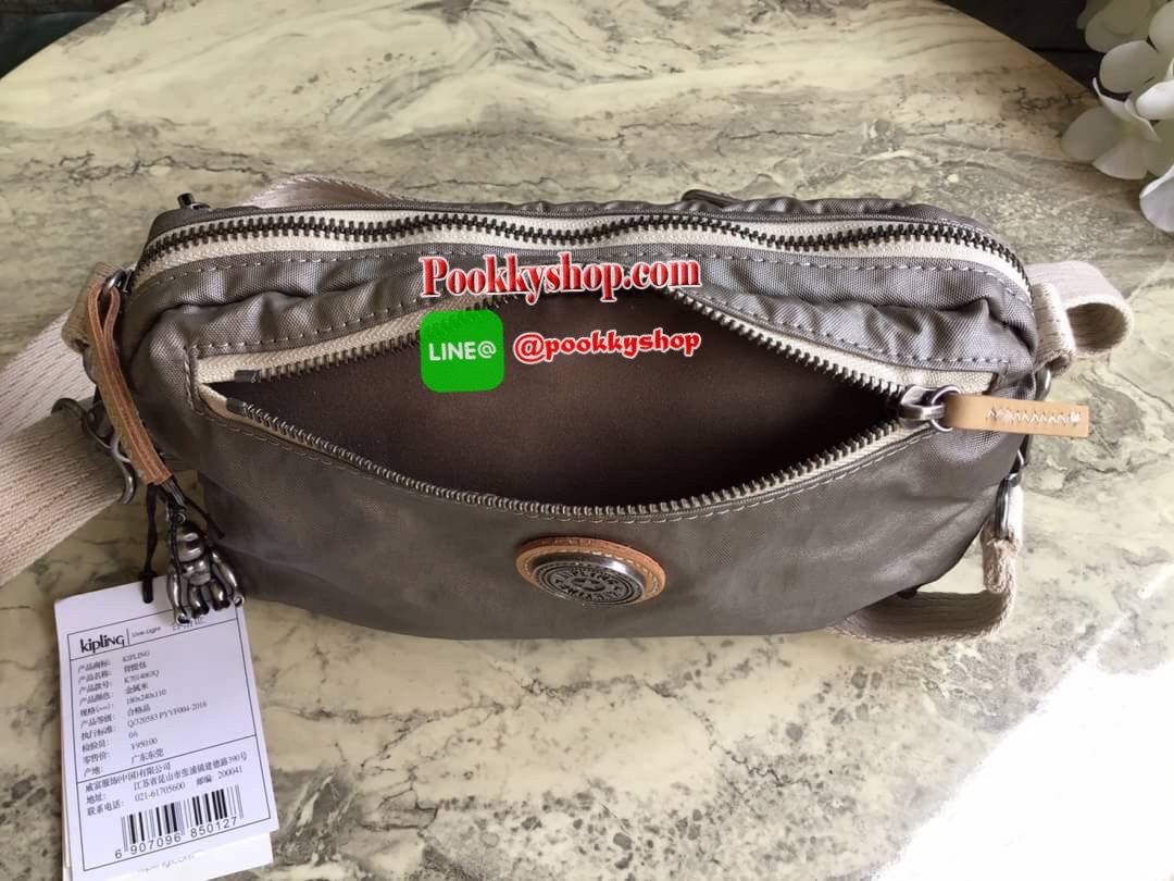 Kipling Yoku Medium Crossbody bag convertible to waistbag กระเป๋าคาดอกและสะพายข้าง คอลเลคชั่นใหม่ล่าสุดจาก Part of the Edgeland Plus วัสดุ100% polyester วัสดุกันน้ำ สีสันสไตล์วินเทจ ดูเป็นเอกลักษณ์ น้ำหนักเบา สะพายแล้วคล่องตัว ภายในกว้าง ใส่กระเป๋าเงินใบย