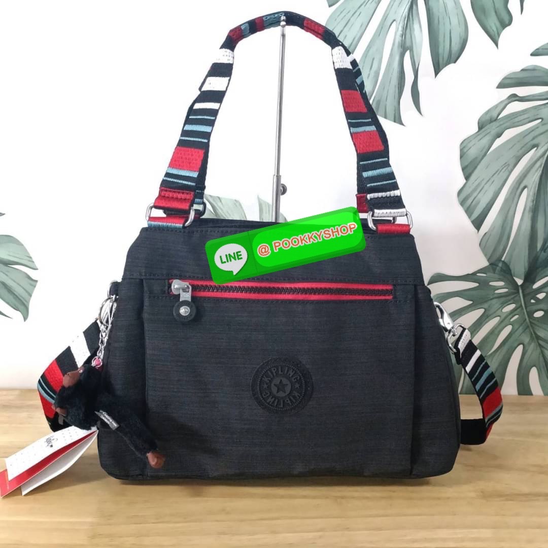 KIPLING ELISE HANDBAG กระเป๋าถือและสะพายไหล่ วัสดุ Nylon +Polyester ขนาดกำลังพอดี จุของได้มาก มีหูจับสองสาย ถือสะดวก น้ำหนักเบา มีช่องซิป ด้านหน้า ช่อง กระเป๋าหลักเปิด-ปิดด้วยซิป มี3 ช่องว่างใส่ของได้จุมากๆ ใส่มือถือได้ กระเป๋าสตางค์ใบยาว และ เครื่องสำอาง