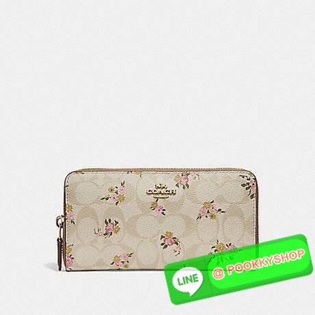 COACH F31778 ACCORDION ZIP WALLET IN SIGNATURE CANVAS WITH DAISY BUNDLE PRINT กระเป๋าสตางค์ใบยาว ลวดลายดอกเดซี่ น่ารักน่าใช้มากๆ พื้นเป็นลายซีเอกลักษณ์ วัสดุหนังแคนวาสเคลือบลาย เปิด-ปิดด้วยซิปรอบ ใส่มือถือได้ ใส่บัตร ใส่ธนบัตรได้สบายๆ พกใบนี้รับรองวางไม่ล