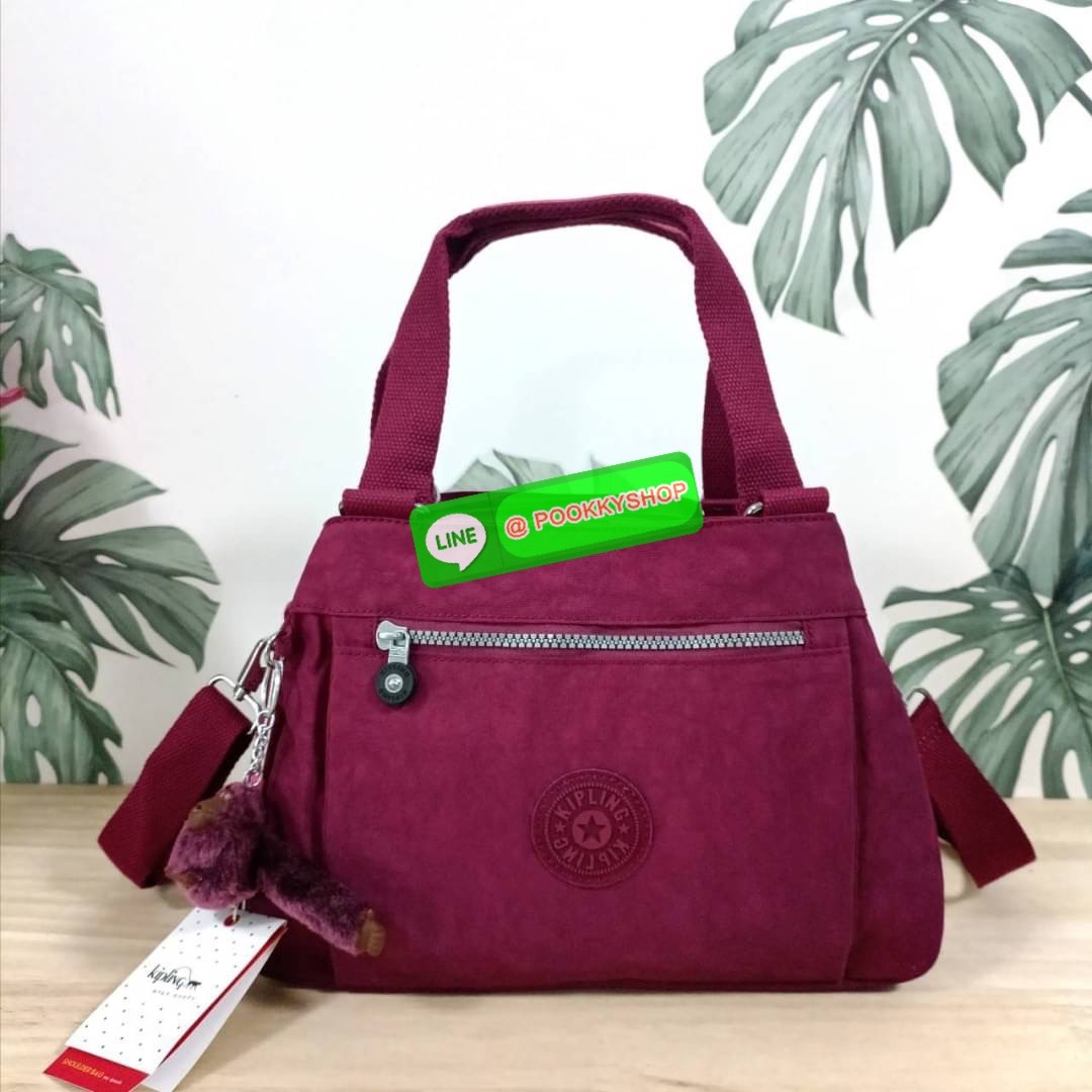 KIPLING ELISE HANDBAG กระเป๋าถือและสะพายไหล่ วัสดุ Nylon +Polyester ขนาดกำลังพอดี จุของได้มาก มีหูจับสองสาย ถือสะดวก น้ำหนักเบา มีช่องซิป ด้านหน้า ช่อง กระเป๋าหลักเปิด-ปิดด้วยซิป มี3 ช่องว่างใส่ของได้จุมากๆ ใส่มือถือได้ กระเป๋าสตางค์ใบยาว และ เครื่องสำอาง