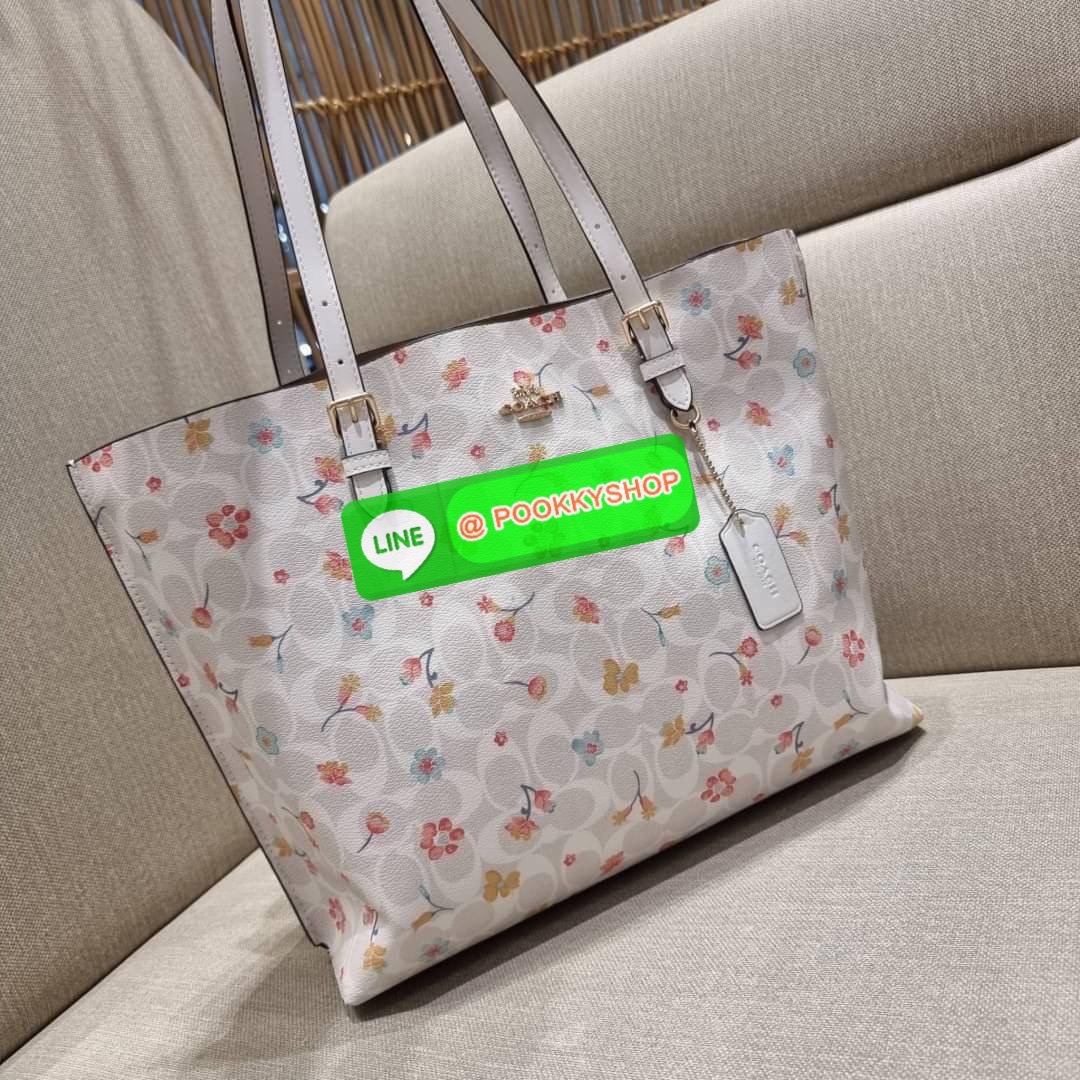 COACH C8612 MOLLIE TOTE IN SIGNATURE CANVAS WITH MYSTICAL FLORAL PRINT กระเป๋าทรงโท้ท ใบใหญ่จุใจ สวยคุ้มค่าดีไซน์ใหม่ น่าใช้ที่สุด วัสดุหนังแคนวาส หูสะพายในตัว ปรับได้อีกเล็กน้อย ภายในโล่งกว้างมาก มีช่องซิปแยกให้ ใบนี้สามารถใส่เสิ้อผ้าไปเที่ยวแบบ short va