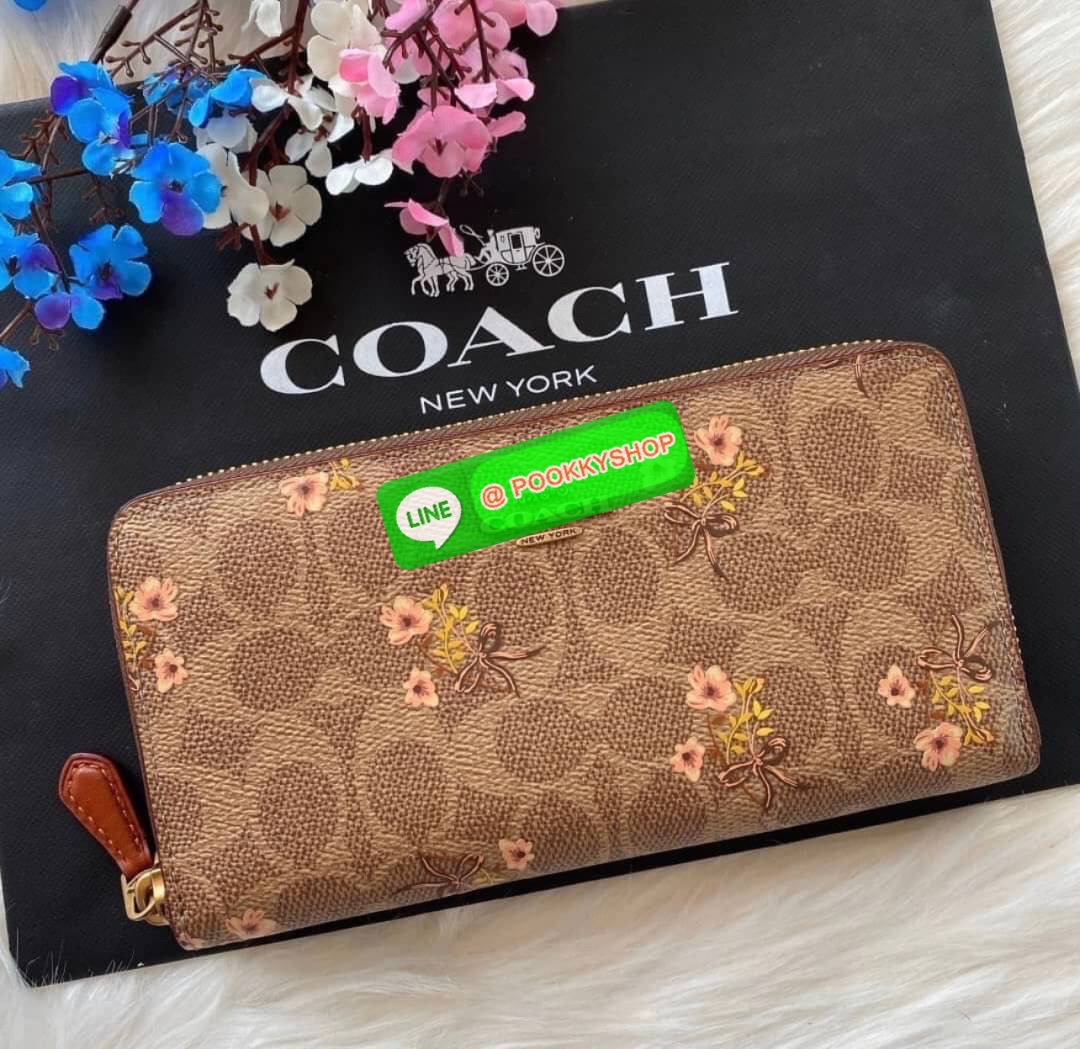 Coach Accordion Zip Wallet In Signature Canvas With Floral Bow Print