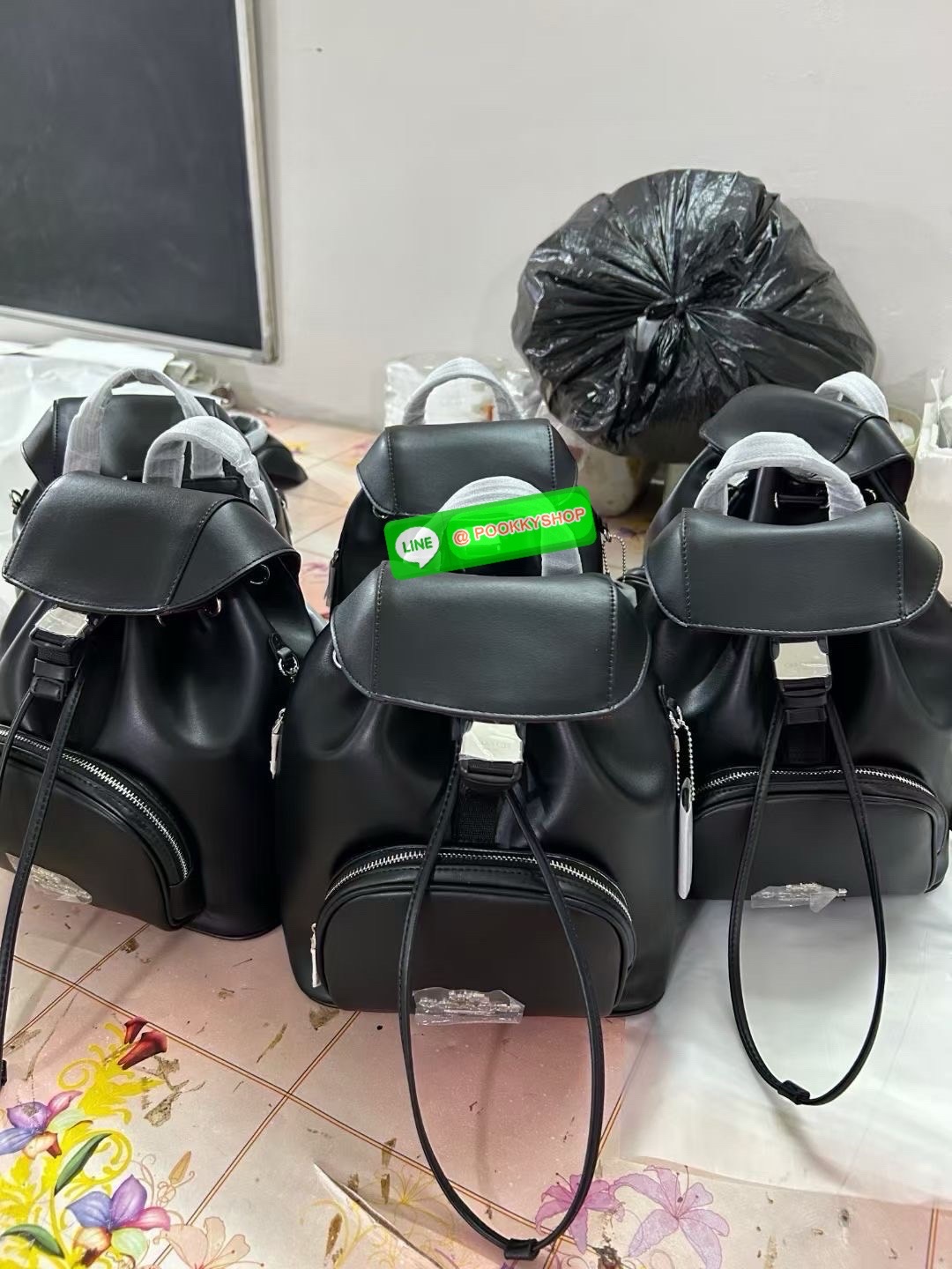 COACH PACE BACKPACK COACH CR100 | Refined calf leather | Inside zip and multifunction pockets | Drawstring and speedclip closures, fabric lining | Handle with 3" drop | Outside zip pocket | Outside zip access to interior |