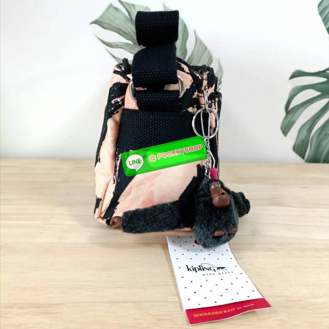 KIPLING Mini Crossbodybag กระเป๋าสะพายข้างขนาดกะทัดรัด ผลิตจากวัสดุ Nylon + ซับใน Polyester100% มีช่องใช้งานแยกย่อยมากถึง 4 ช่อง -ด้านหน้ามีช่องซิป 2 ช่อง -ช่องหลักโล่ง กว้าง จุของใช้ได้เยอะ -ด้านหลังมีช่องซิปอีก 1 ช่อง มาพร้อมพวงกุญเเจลิง สายสะพายยาวสมาร