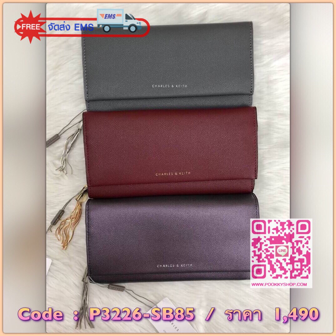 New arrival CHARLES & KEITH TASSEL DETAIL LONG WALLET BAG พร้อมส่งอีกครั้ง พร้อมเฉดสีใหม่ปี 2018ค่ะ!!! หระเป๋าสตางค์ใบยาวแบบฝาพับแม่เหล้ก ลายหนังคาร์เวีย สวย เรียบหรู ดูดี มากๆค่ะ ภายในกระเป๋าแบ่งเป็นช่องซิปยาวตอนหน้า ที่ตัวซิปเป็นอะไหล่พู่ห้อยลงมา เก๋มาก
