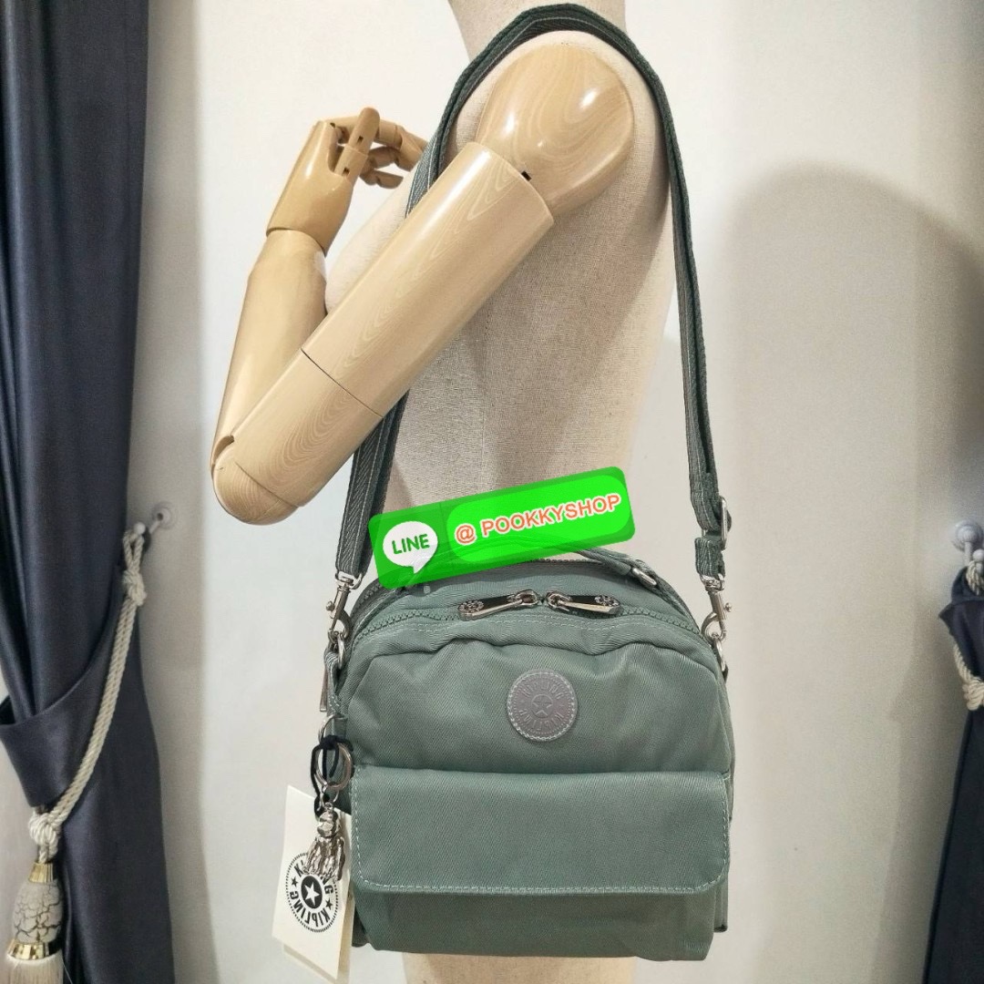 KIPLING Cand 2 ways backpack กระเป๋าถือหรือสะพายข้าง ขนาดกลาง วัสดุ Polyester 100% -ด้านหน้ามี 2 ช่องซิป -ช่องหลักโล่งกว้าง ใส่ของได้เยอะสุดๆ พร้อมช่องซิปและช่องแยกด้านข้างให้แยกของได้เป็นระเบียบมากขึ้น สามารถติใส่กระเป๋าสตางค์ใบยาวได้ มาพร้อมสายคล้องพวงก