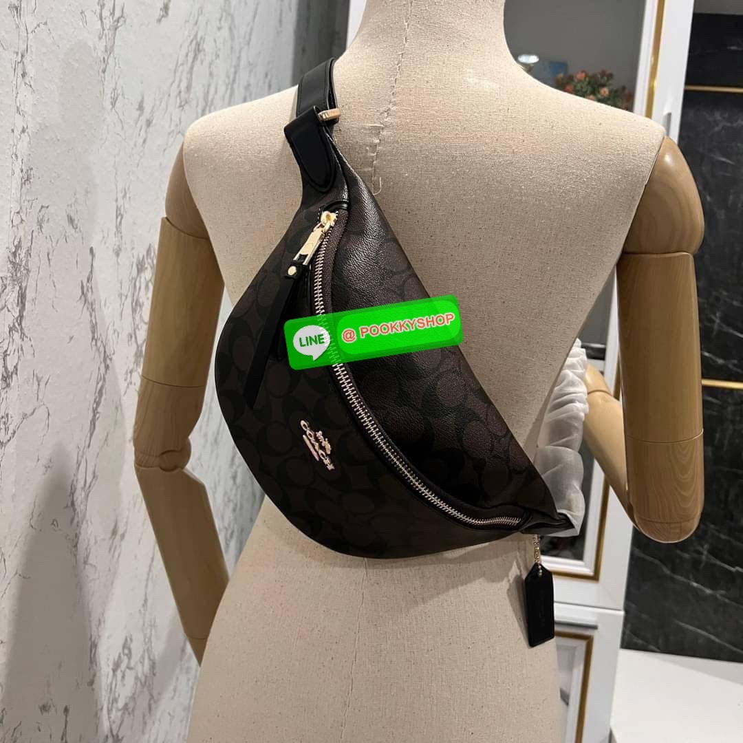 COACH F48740 BELT BAG IN SIGNATURE CANVAS กระเป๋าคาดอกทรง Unisex ทรงโดมรุ่นยอดฮิตไม่มีตกเทรน สวยเท่ทุกสี วัสดุหนังแคนวาสเคลือบคุณภาพดีตัดหนังแท้ ทนทาน ใช้งานง่าย ภายในเป็นช่องโล่ง ใส่ของได้เยอะ หยิบจับได้สะดวก ใช้ได้ทั้งชายและหญิง ใบจริงสวยไม่ผิดหวังคะ