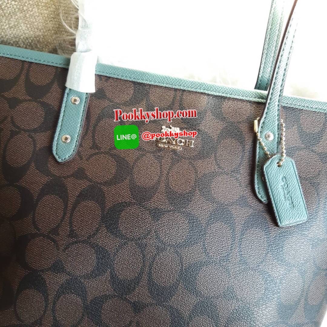 COACH F22969 MINI CITY ZIP TOTE IN SIGNATURE CANVAS กระเป๋าถือทรงโท้ท ไซส์มินิ น่ารักน่าใช้ สะพายคล้องไหล่ได้เก๋ๆ เห็นใบเล็กแบบนี้ จุของแน่นๆไปเลยจ้า!! 😘 สีสวยคม วัสดุหนังแคนวาสคุณภาพ ปากกระเป๋าเปิด-ปิดด้วยซิป กันของหล่นได้ ถือไปไหนก็ได้ ถ่ายรูปชิ