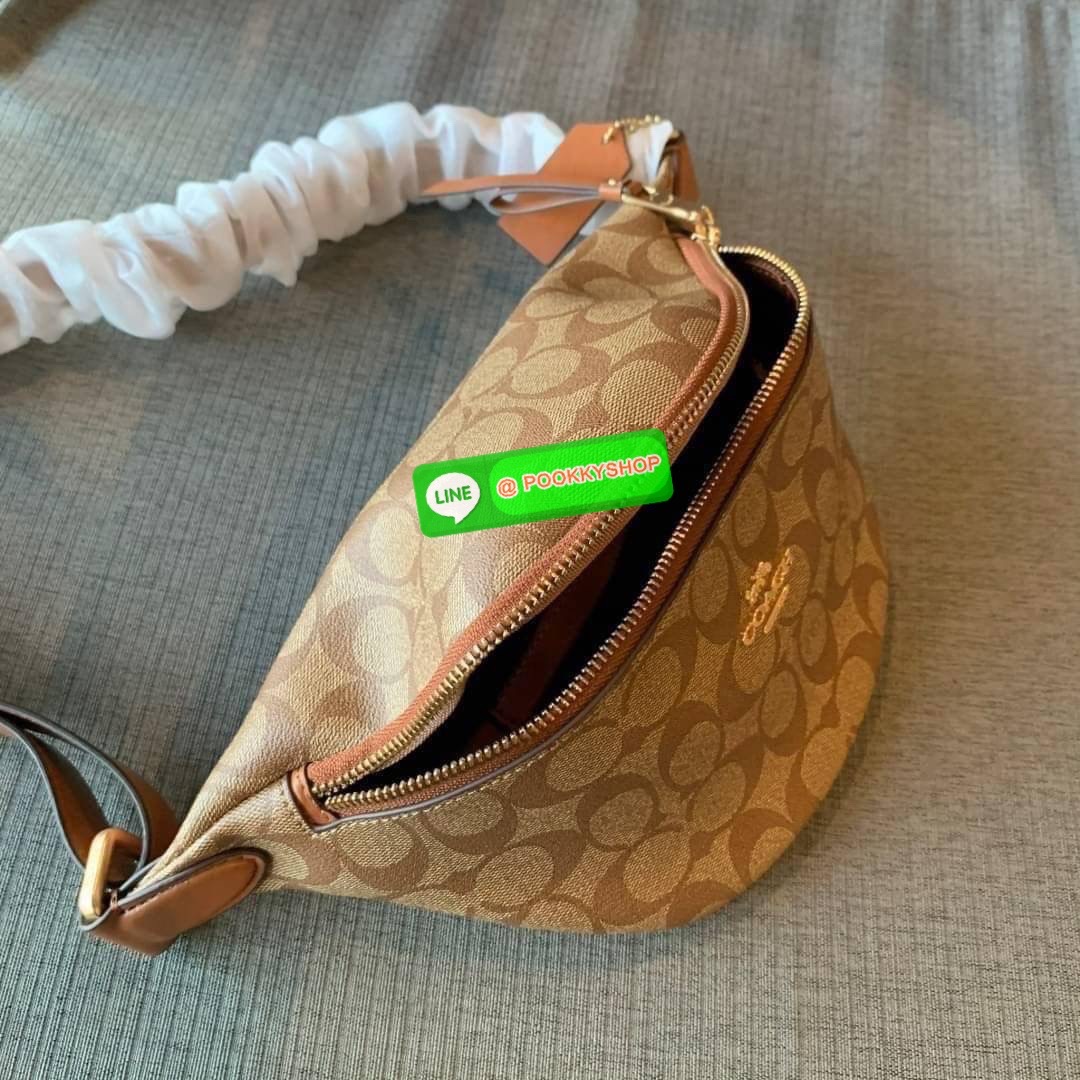 COACH F48740 BELT BAG IN SIGNATURE CANVAS กระเป๋าคาดอกทรง Unisex ทรงโดมรุ่นยอดฮิตไม่มีตกเทรน สวยเท่ทุกสี วัสดุหนังแคนวาสเคลือบคุณภาพดีตัดหนังแท้ ทนทาน ใช้งานง่าย ภายในเป็นช่องโล่ง ใส่ของได้เยอะ หยิบจับได้สะดวก ใช้ได้ทั้งชายและหญิง ใบจริงสวยไม่ผิดหวังคะ