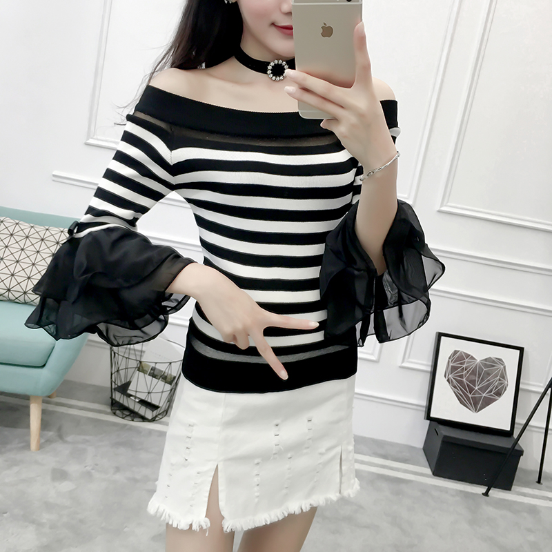 เสื้อแฟชั่นคอปาดซีทรูหน้าอกตัดต่อปลายแขนระบายเลเยอร์ สีดำลายริ้ว