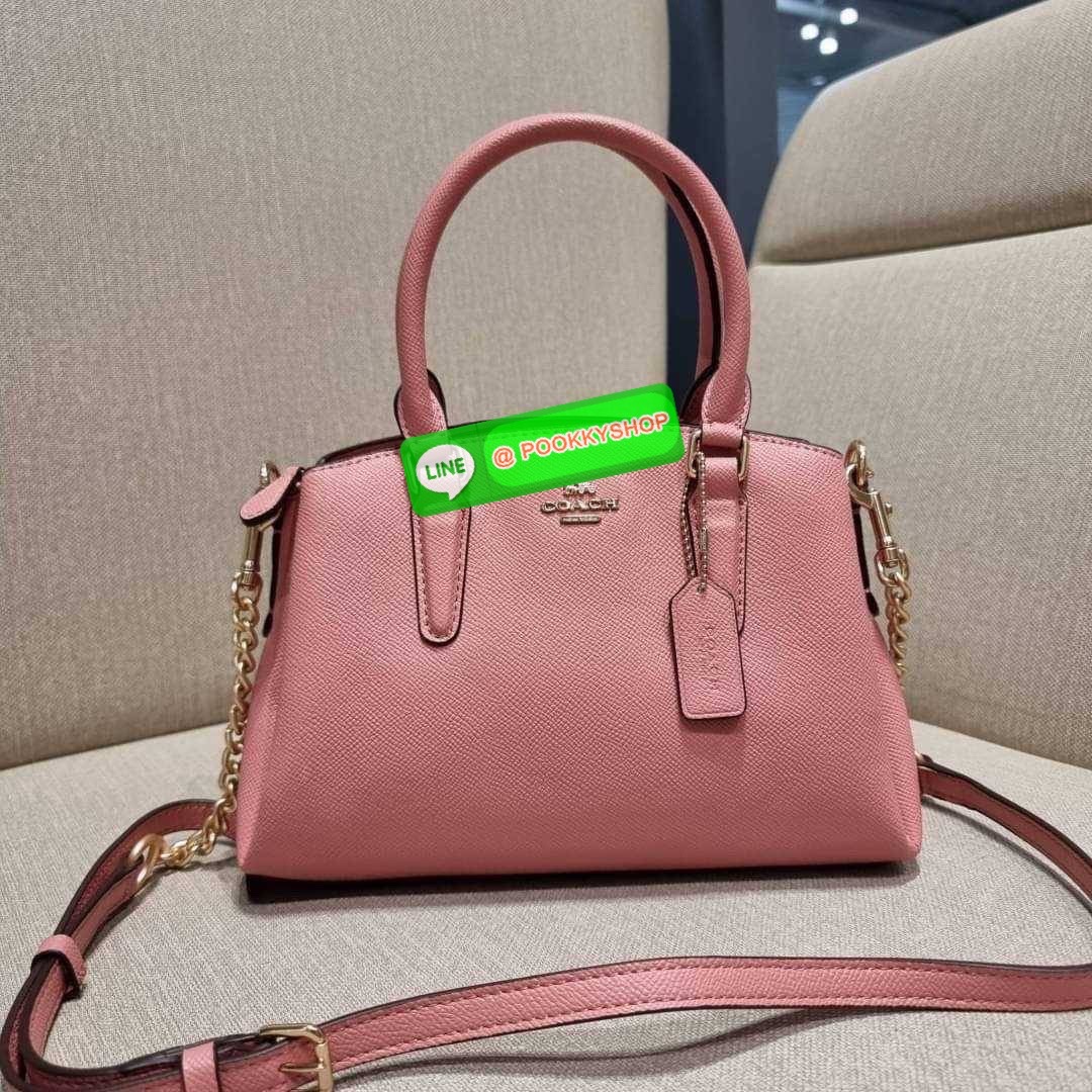 COACH F29434 MINI SAGE CARRYALL IN SIGNATURE CANVAS รุ่นยอดฮิต!! ที่สุดของกระเป๋าสะพายขายดี ต้องทรงถังมินิรุ่นนี้ วัสดุหนังแคนวาสเคลือบลาย สวย คลาสสิค มาพร้อมสายสะพายข้างและหูหิ้วในตัว ถอดออกถือคล้องแขนเก๋ๆ หรูๆยังได้ ภายในเป็นช่องโล่ง แบ่งสัดส่วนอย่างดี