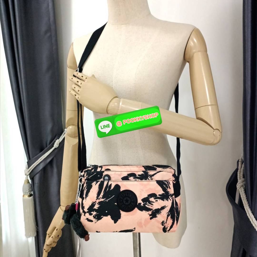 KIPLING Mini Crossbodybag กระเป๋าสะพายข้างขนาดกะทัดรัด ผลิตจากวัสดุ Nylon + ซับใน Polyester100% มีช่องใช้งานแยกย่อยมากถึง 4 ช่อง -ด้านหน้ามีช่องซิป 2 ช่อง -ช่องหลักโล่ง กว้าง จุของใช้ได้เยอะ -ด้านหลังมีช่องซิปอีก 1 ช่อง มาพร้อมพวงกุญเเจลิง สายสะพายยาวสมาร