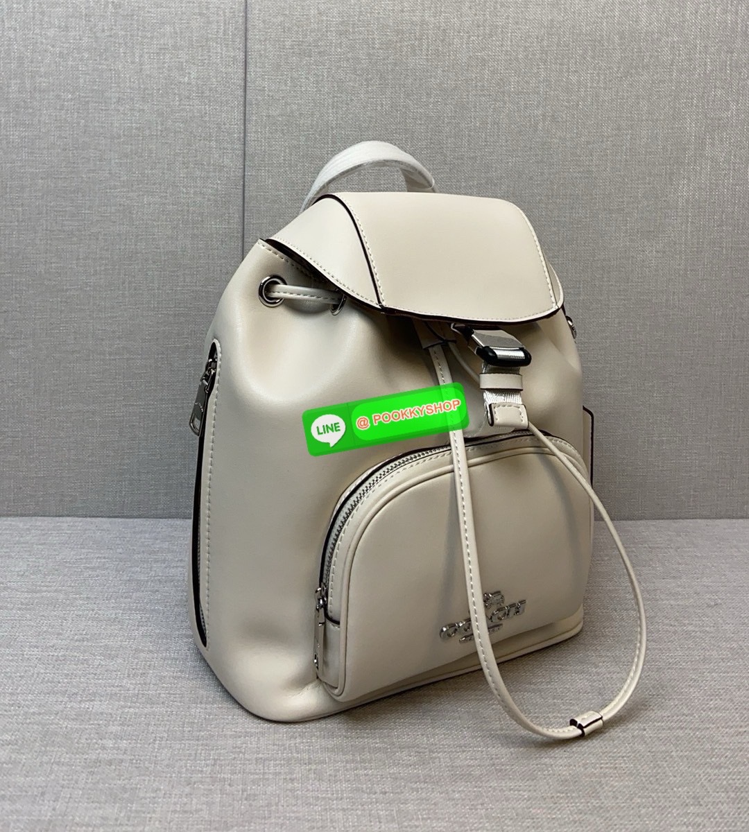 COACH PACE BACKPACK COACH CR100 | Refined calf leather | Inside zip and multifunction pockets | Drawstring and speedclip closures, fabric lining | Handle with 3" drop | Outside zip pocket | Outside zip access to interior |