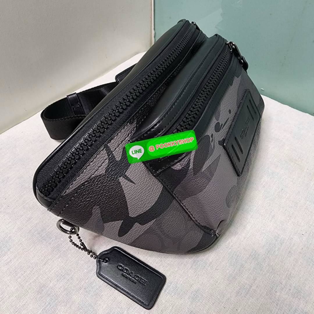 กระเป๋า คาดอก/คาดเอว COACH TERRAIN BELT BAG IN SIGNATURE CANVAS WITH CAMO PRINT (COACH F89034) เป๋าคาดเข็มขัด ผ้าใบเคลือบซิกเนเจอร์และหนังลูกวัวอย่างดี ภายในกระเป๋ามัลติฟังก์ชั่น ปิดด้วยซิป ซับในผ้า กระเป๋าซิปด้านนอก สายปรับได้สำหรับสวมใส่ที่เอว