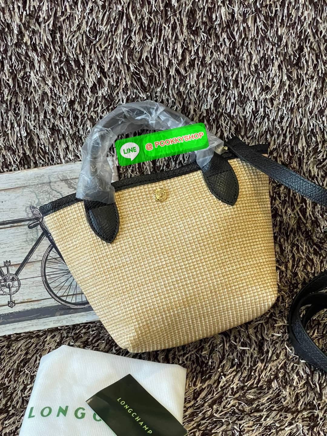 ðLONGCHAMP Le Pliage Paris - St Tropez Handtasche āļĢāļļāđāļāđāļŦāļĄāđāļāļēāļāđāļāļĢāļāļāđ āđāļāđāļāļāļĢāļ°āđāļāđāļēāļāļ·āļāļŦāļĢāļ·āļāļŠāļ°āļāļēāļĒ āļāļēāļāļŠāļēāļ raffia āļāļēāļāļāļĢāļ°āđāļāđāļēāļāļąāļāļāđāļ§āļĒāļŦāļāļąāļāļŠāļĩāļāđāļ§āļĒāļĨāļļāļāļāđāļŠāļļāļāđāļāđāļāļāļāđāļŦāļĨāđāļē Celebrities āļāļąāļāļāļĢāļ°āđāļāđāļēāļāļīāļāļāļīāļāļŠāļļāļāļŪāļīāļāļāļēāļ Longchamp āļāļĒāđāļēāļ Le Pliage Paille (āđāļĨāļ āļāļĨāļīāļĒāļēāļ āđāļāļĨāđ) āļĄāļĩāđāļĨāđ