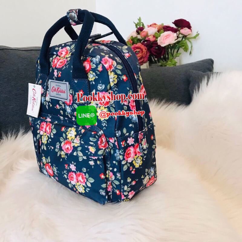 Best Seller !! Cath Kidston Multi Strap Backpack กระเป๋าสะพายเป้รุ่นมินิ แบรนด์ดังสไตล์วินเทจสุดฮิต วัสดุ Canvas เคลือบกันน้ำสามารถเช็ดทำความสะอาดง่าย เปิดปิดกระเป๋าด้วยซิปสะดวกใช้ ด้านหน้าประดับโลโก้แบรนด์สวยโดดเด่น พร้อมช่องซิปด้านหน้ากระเป๋าอีกหนึ่งช่อ