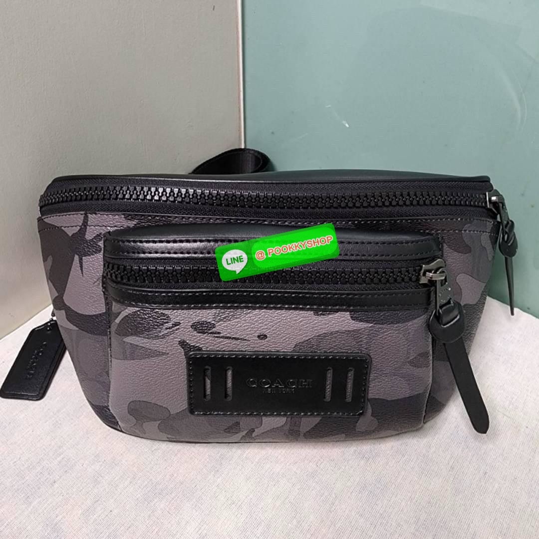 กระเป๋า คาดอก/คาดเอว COACH TERRAIN BELT BAG IN SIGNATURE CANVAS WITH CAMO PRINT (COACH F89034) เป๋าคาดเข็มขัด ผ้าใบเคลือบซิกเนเจอร์และหนังลูกวัวอย่างดี ภายในกระเป๋ามัลติฟังก์ชั่น ปิดด้วยซิป ซับในผ้า กระเป๋าซิปด้านนอก สายปรับได้สำหรับสวมใส่ที่เอว