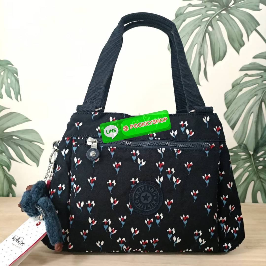 KIPLING ELISE HANDBAG กระเป๋าถือและสะพายไหล่ วัสดุ Nylon +Polyester ขนาดกำลังพอดี จุของได้มาก มีหูจับสองสาย ถือสะดวก น้ำหนักเบา มีช่องซิป ด้านหน้า ช่อง กระเป๋าหลักเปิด-ปิดด้วยซิป มี3 ช่องว่างใส่ของได้จุมากๆ ใส่มือถือได้ กระเป๋าสตางค์ใบยาว และ เครื่องสำอาง