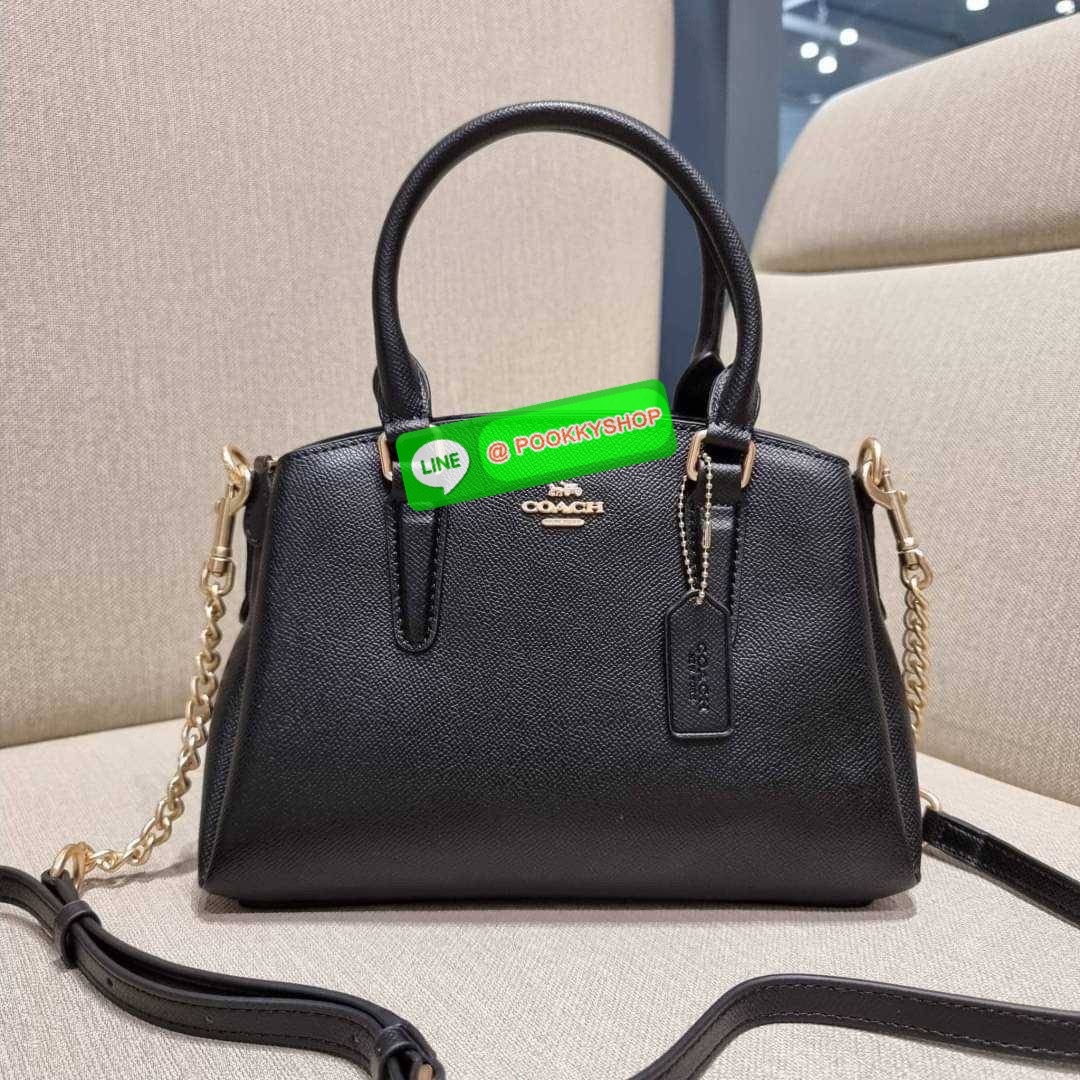 COACH F29434 MINI SAGE CARRYALL IN SIGNATURE CANVAS รุ่นยอดฮิต!! ที่สุดของกระเป๋าสะพายขายดี ต้องทรงถังมินิรุ่นนี้ วัสดุหนังแคนวาสเคลือบลาย สวย คลาสสิค มาพร้อมสายสะพายข้างและหูหิ้วในตัว ถอดออกถือคล้องแขนเก๋ๆ หรูๆยังได้ ภายในเป็นช่องโล่ง แบ่งสัดส่วนอย่างดี
