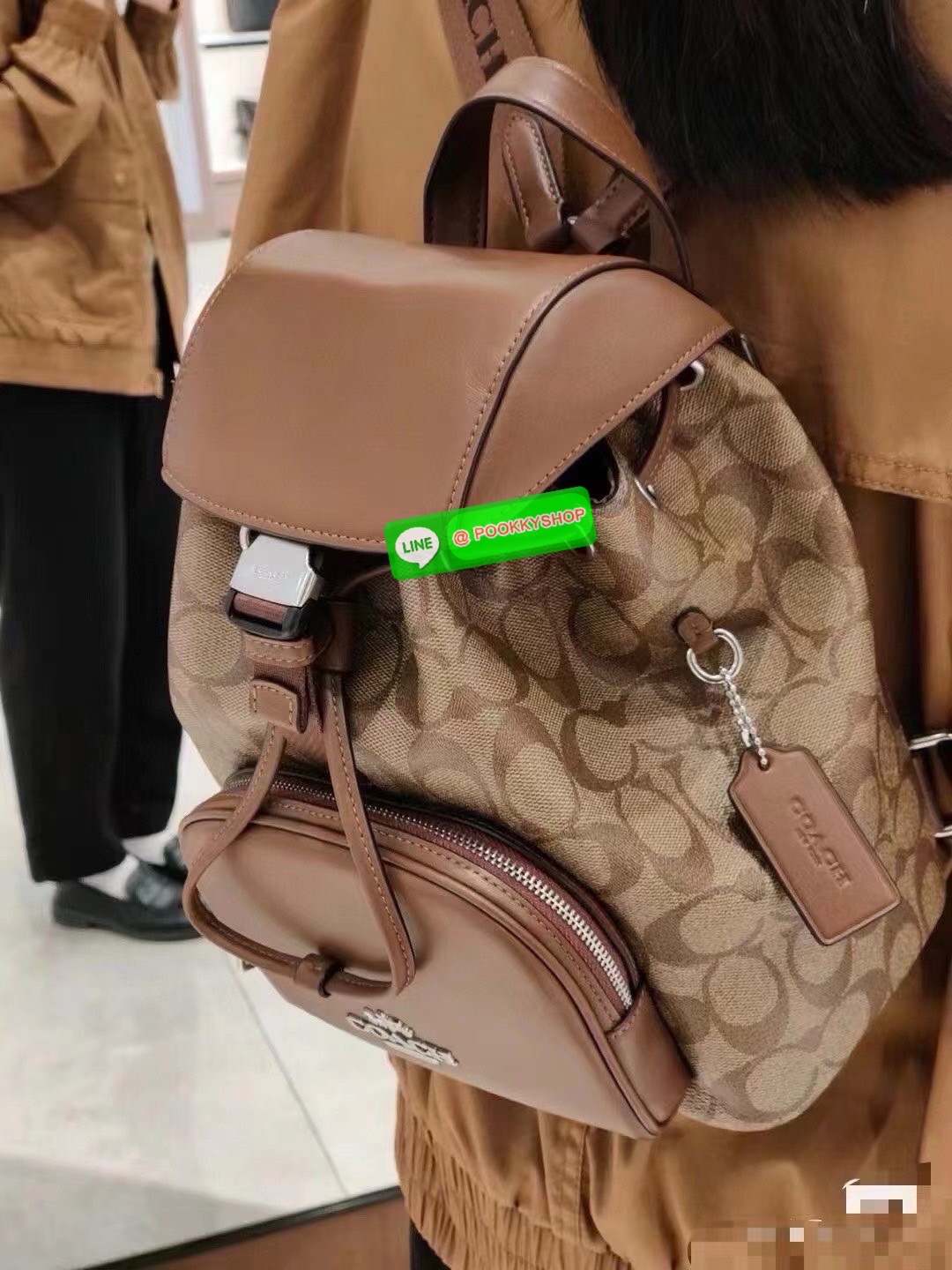 COACH PACE BACKPACK COACH CR100 | Refined calf leather | Inside zip and multifunction pockets | Drawstring and speedclip closures, fabric lining | Handle with 3" drop | Outside zip pocket | Outside zip access to interior |