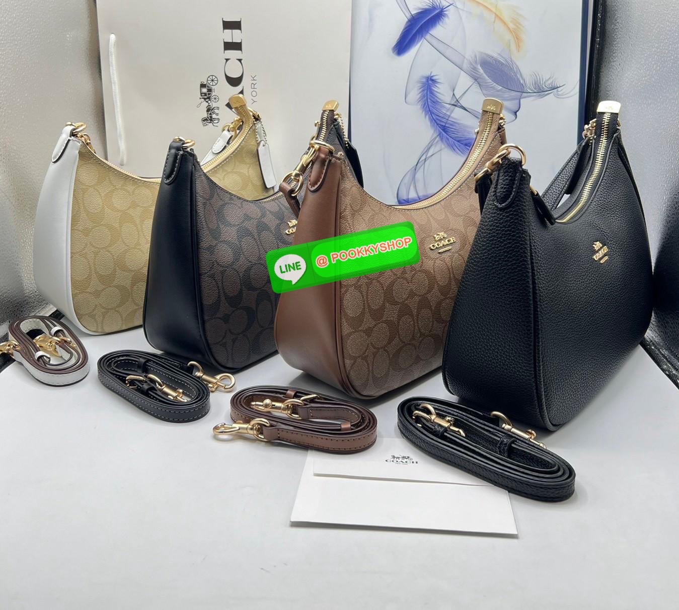 Coach Teri Hobo In Signature Canvas กระเป๋าคล้องไหล่และสะพายข้าง วัสดุแคนวาส+หนังแท้ เปิด-ปิดกระเป๋าแบบซิป ภายในโล่ง มีช่องซิป1ช่อง ช่องใส่ของจุกจิกอีก1ช่อง ด้านหลังมีช่องซิป1ช่อง มีสาย2เส้น สำหรับคล้องไหล่และสะพายข้าง