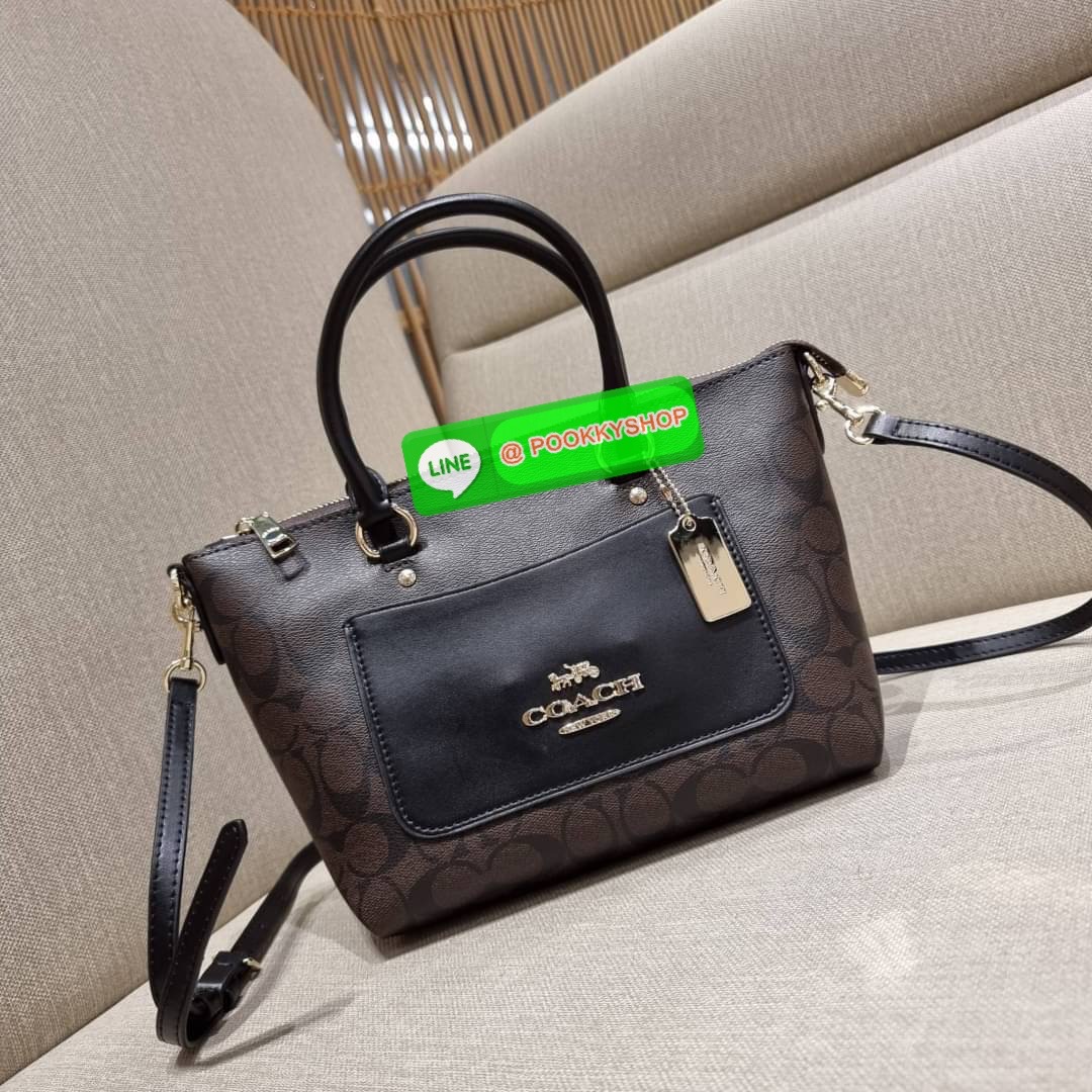 COACH F38089 MINI EMMA SATCHEL IN SIGNATURE CANVAS รุ่นหายาก รุ่นที่สาวๆตามหา จัดมาให้สมกับที่รอคอยกันไปเลยจ้า!! เป็นรุ่นที่ดีไซน์ออกมาให้ใช้งานง่าย สะดวก สวย หรู ดูดี!! กระเป๋าสะพายทรงสวย วัสดุหนังแคนวาสเคลือบลาย มาพร้อมสายสะพายข้างและหูจับในตัว ถอดออกถื