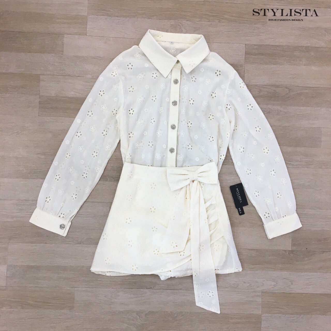 ชุดเซทแฟชั่น ชุดเซ็ต 2 ชิ้นทรงเชิ้ตแขนยาว + กระโปรงทรงไขว้ผูกโบว์สุดคิ้วท์