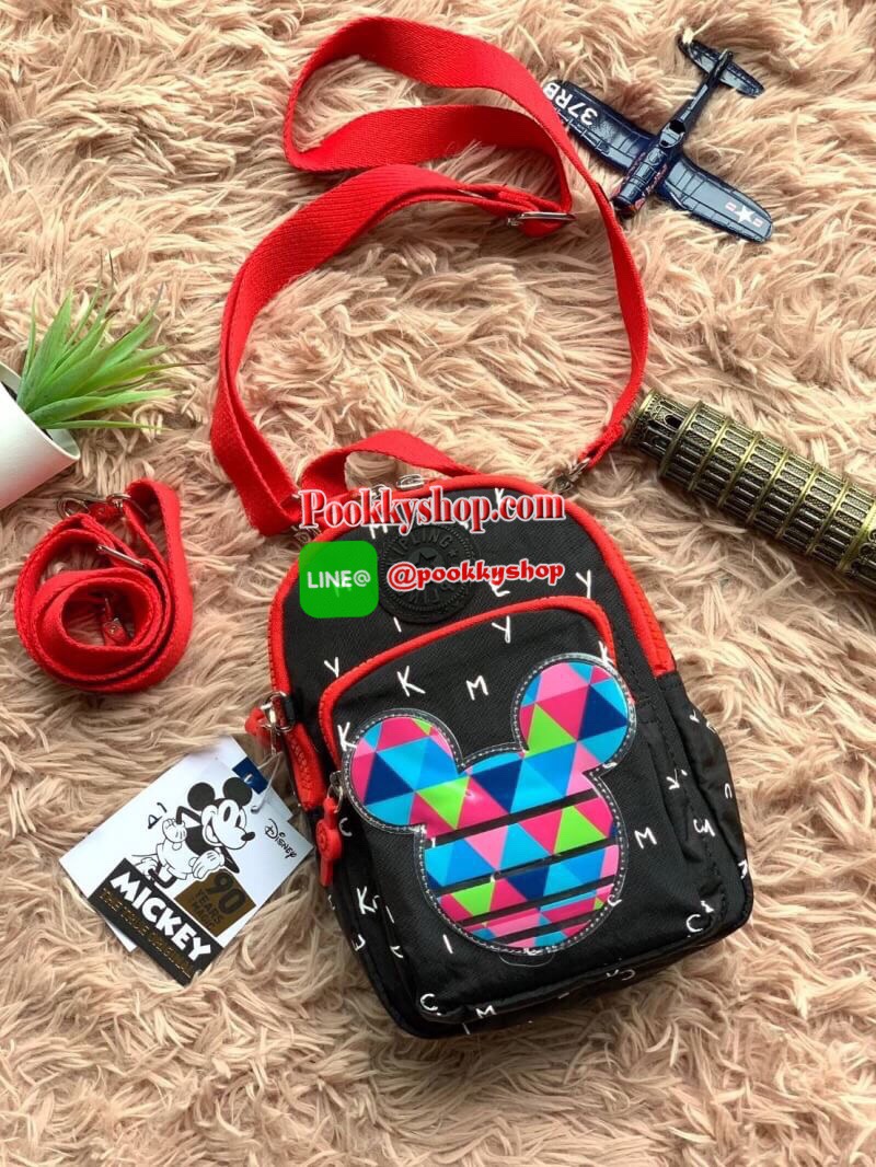 Kipling BRight Disney's Minnie Mouse And Mickey Mouse รุ่น Mini Backpack เป็นได้ทั้งทรงcrossbody และmini Backpack พร้อมสายสะพาย2เส้น ปรับฟรีไซส์ได้ สามารถน้ำหนักเบา วัสดุ100% Polyamide ดีเทลน่ารักๆจากบรรดามิคกี้และมินนี่ที่มาวาดลวดลายลงบนกระเป๋าให้ดู