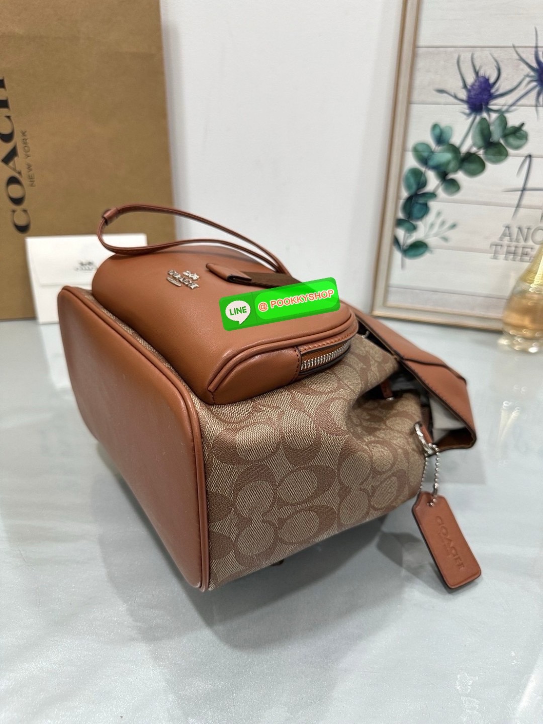 COACH PACE BACKPACK COACH CR100 | Refined calf leather | Inside zip and multifunction pockets | Drawstring and speedclip closures, fabric lining | Handle with 3" drop | Outside zip pocket | Outside zip access to interior |