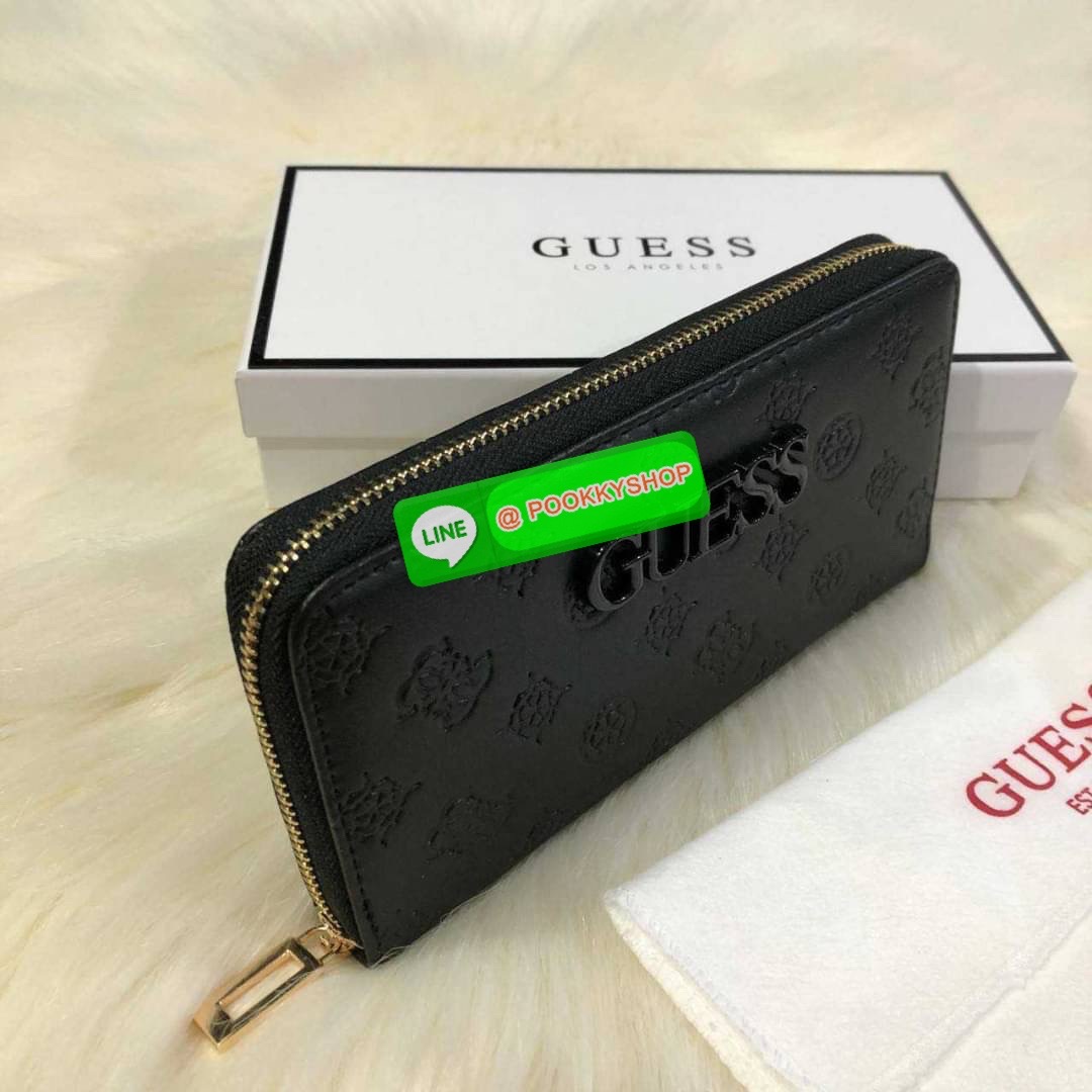 GUESS WOMEN'S LONG WALLET กระเป๋าสตางค์ใบยาว สวยมากค่ะ เปิดปิดด้วยซิป ด้านหน้าประดับโลโก้แบรนด์ ด้านหลังมีช่องซิป หัวซิปแบรนด์ทุกจุด ภายในมีช่องใส่ธนบัตรแบงก์พัน ช่องซิปกลางและช่องใส่บัตรหลายช่องสวยน่าใช้ทุกสีค่ะ มาพร้อมกล่องกระดาษแบรนด์และถุงผ้ามอบเ