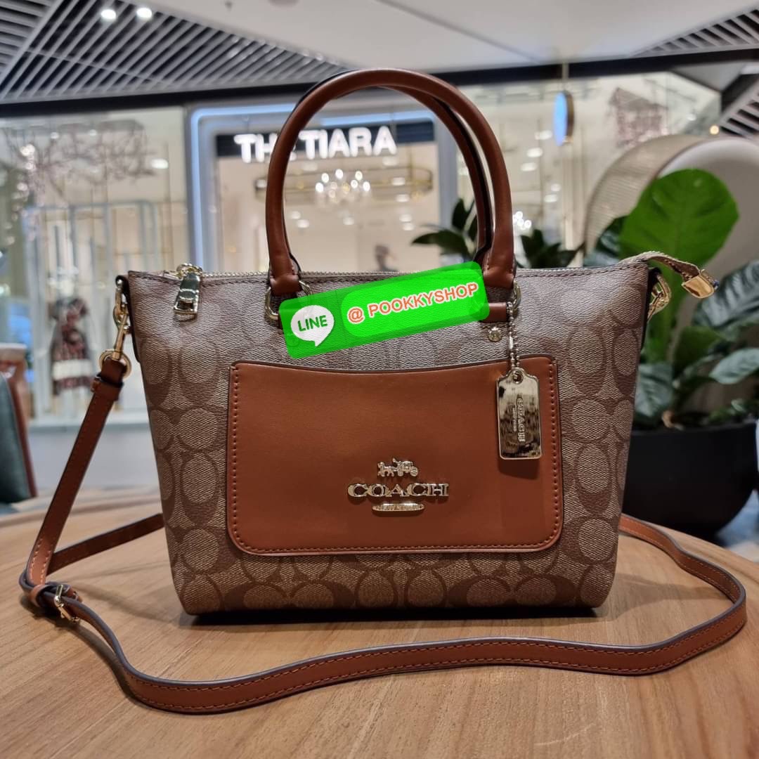 COACH F38089 MINI EMMA SATCHEL IN SIGNATURE CANVAS รุ่นหายาก รุ่นที่สาวๆตามหา จัดมาให้สมกับที่รอคอยกันไปเลยจ้า!! เป็นรุ่นที่ดีไซน์ออกมาให้ใช้งานง่าย สะดวก สวย หรู ดูดี!! กระเป๋าสะพายทรงสวย วัสดุหนังแคนวาสเคลือบลาย มาพร้อมสายสะพายข้างและหูจับในตัว ถอดออกถื