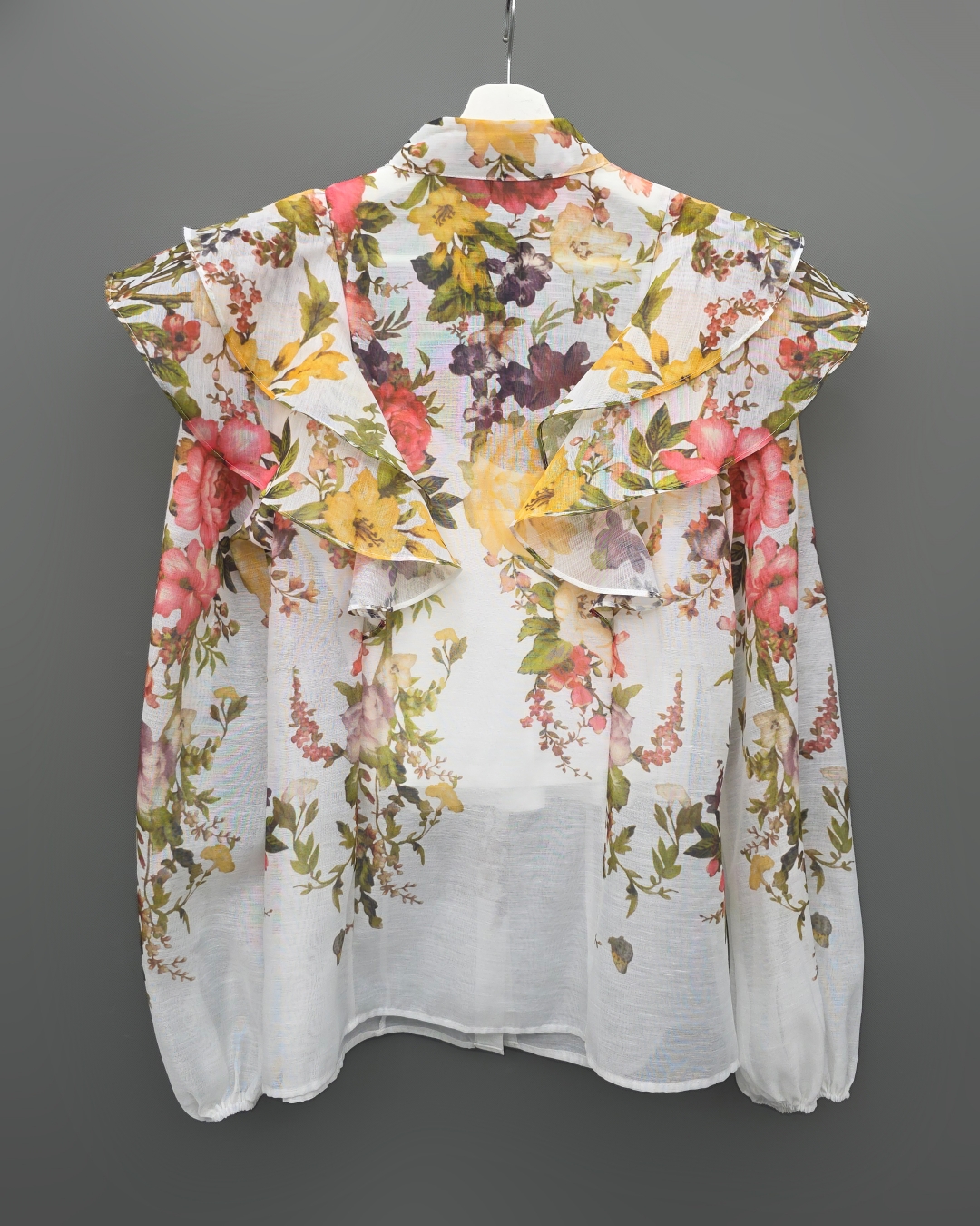 ชุดเซทแฟชั่น เซ็ตเสื้อคอกลมแขนยาว+กระโปรงยาว แต่งระบายตัวเสื้อหน้าและหลัง