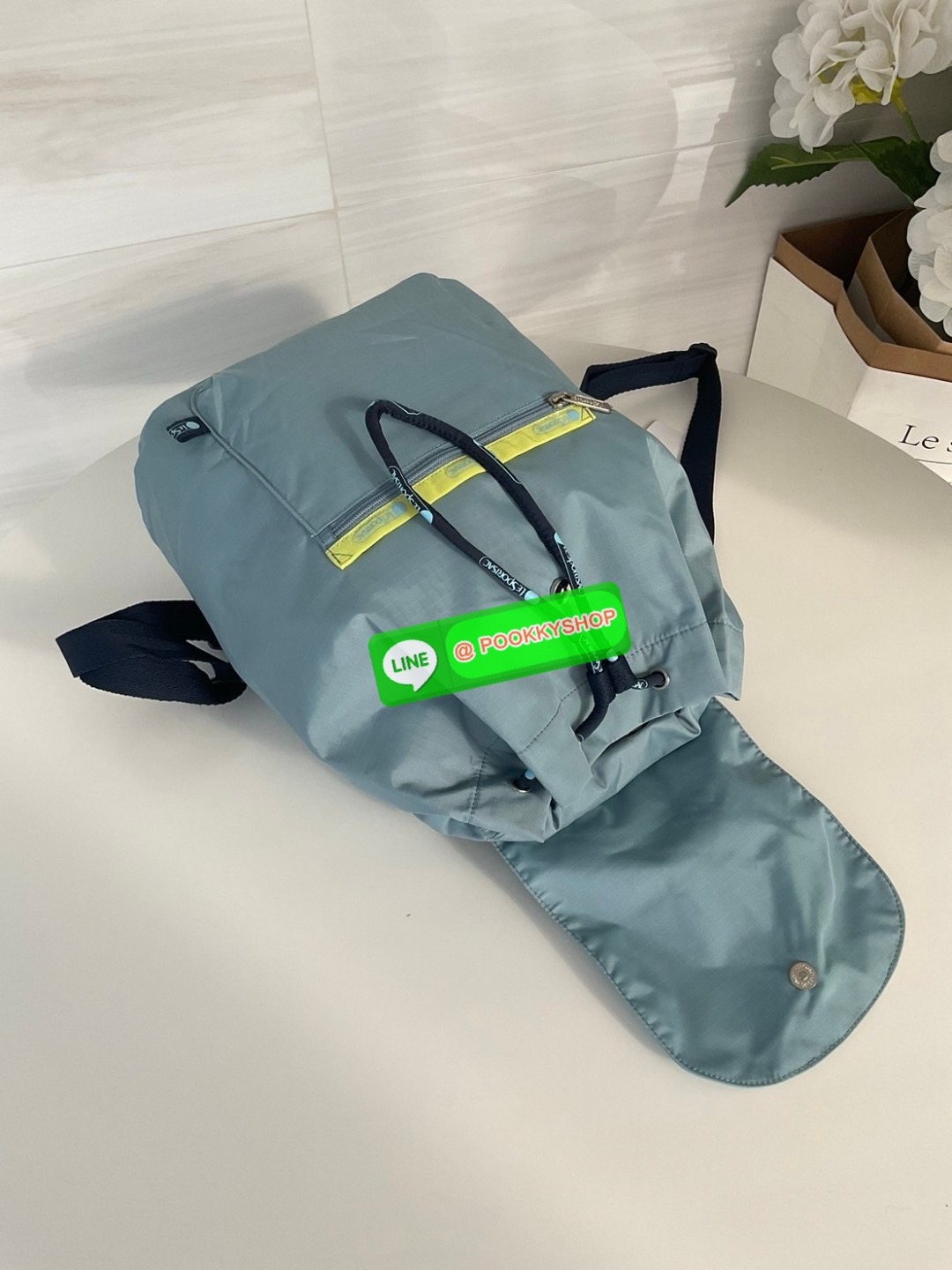 🚚 พร้อมส่ง 🚚 Japan LeSportsac Casual Versatile Portable Women's Bag Solid Color Blue Bucket Bag Flip Backpack สินค้าแบรนด์แท้100% พร้อมแท็ก! กระเป๋าเป้สะพายหลังลําลอง ทรงบักเก็ต น้ําหนักเบา กระเป๋าเป้หูรูด กระเป๋าเดินทางขนาดกลาง ด้านห
