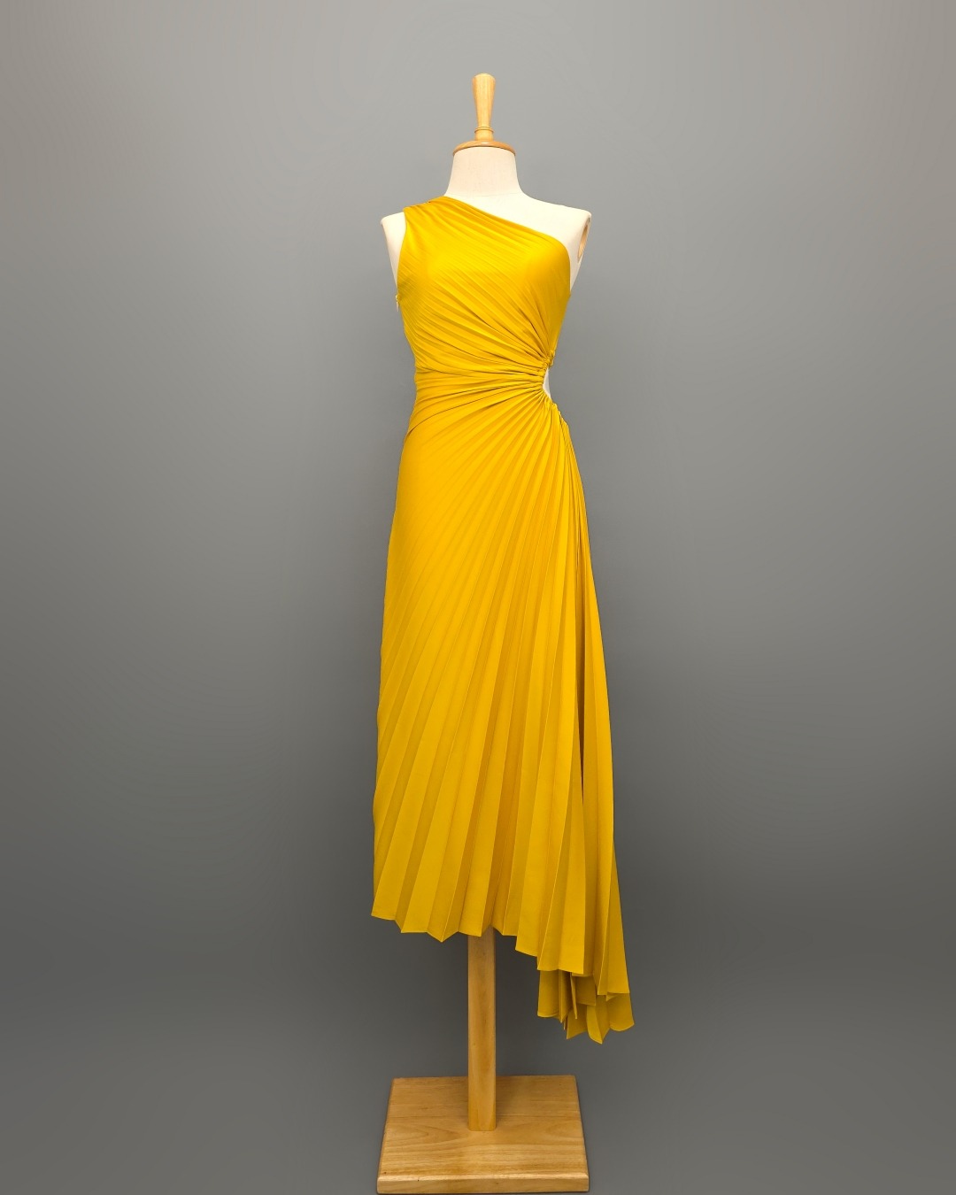 เดรสแฟชั่น เดรสเสื้อไหล่เดียว กระโปรงยาวชายเฉลียง อัดพลีททั้งตัว