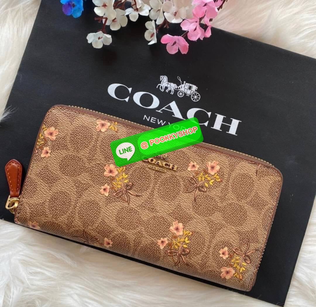 Coach Accordion Zip Wallet In Signature Canvas With Floral Bow Print