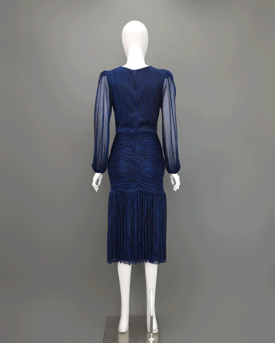 เดรสแฟชั่น เดรสเสื้อคอกลมแขนยาว กระโปรงทรงเข้ารูปจับเดรปตรงกลาง ต่อชายระบาย