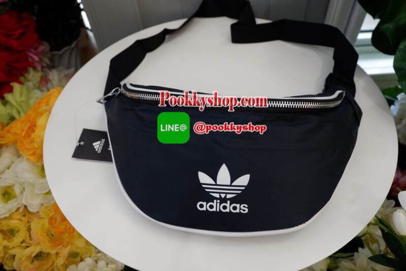 ADIDAS ORIGINALS ADICOLOR WAIST BAG Best seller! **ดาราเซเลปใช้กันเพียบ ช้าอดหมดก่อนนาจา กระเป๋าคาดอก/คาดเอวสุดชิค ดีไซน์เรียบง่าย แต่สะพายแล้วเท่ห์ คลาสสิคสุดๆ อะไหล่เงิน เปิด-ปิด ด้วยซิป ภายในกว้าง ใส่กระเป๋าสตางค์ยาวได้ และของจุกจิกได้ พอประมาณ มีช่องซ