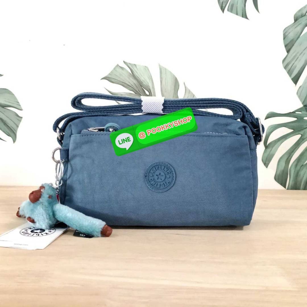 KIPLING Monkey program K16217 Seoul up sling bag รุ่น 3 ซิป สะพายข้าง ขนาดเล็กทรงสี่เหลี่ยมผืนผ้า วัสดุ Nylon 100% หลากหลายฟังก์ชั่นใช้งาน ครบครันในใบเดียว