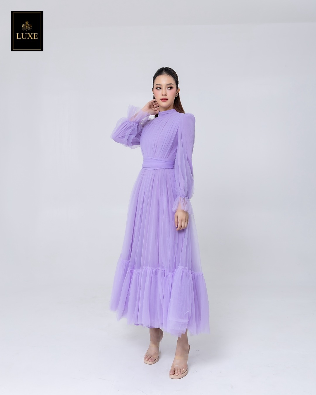 เดรสแฟชั่น แม็กซี่เดรสเสื้อคอปีนแขนยาว กระโปรงบานต่อชายรูดระบายรอบตัว มีโบว์ผูกเอว