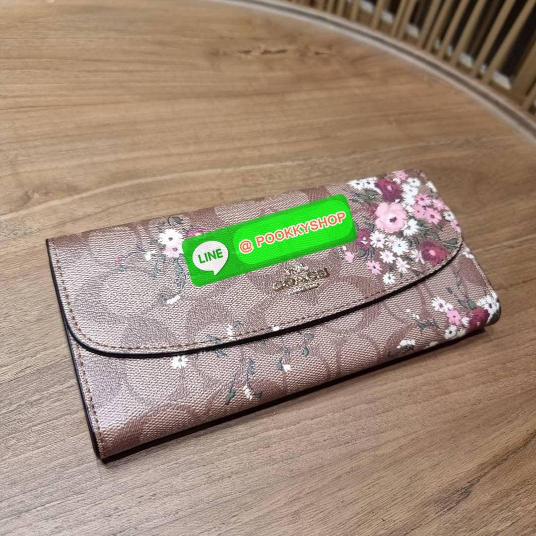 COACH F29395 SLIM ENVELOPE WALLET IN SIGNATURE CANVAS WITH FLORAL BUNDLE PRINT กระเป๋าสตางค์รุ่นขายดี ทรงจดหมายรุ่นฝาพับ ดีไซน์ลายช่อดอกไม้ น่ารักสดใส วัสดุหนังแคนวาสเคลือบลาย ภายในใส่มือถือได้ ใส่บัตรได้ มีช่องซิปแยกแบ่งเป็นสัดส่วน ใบจริงคือดีงาม สาวๆใช้