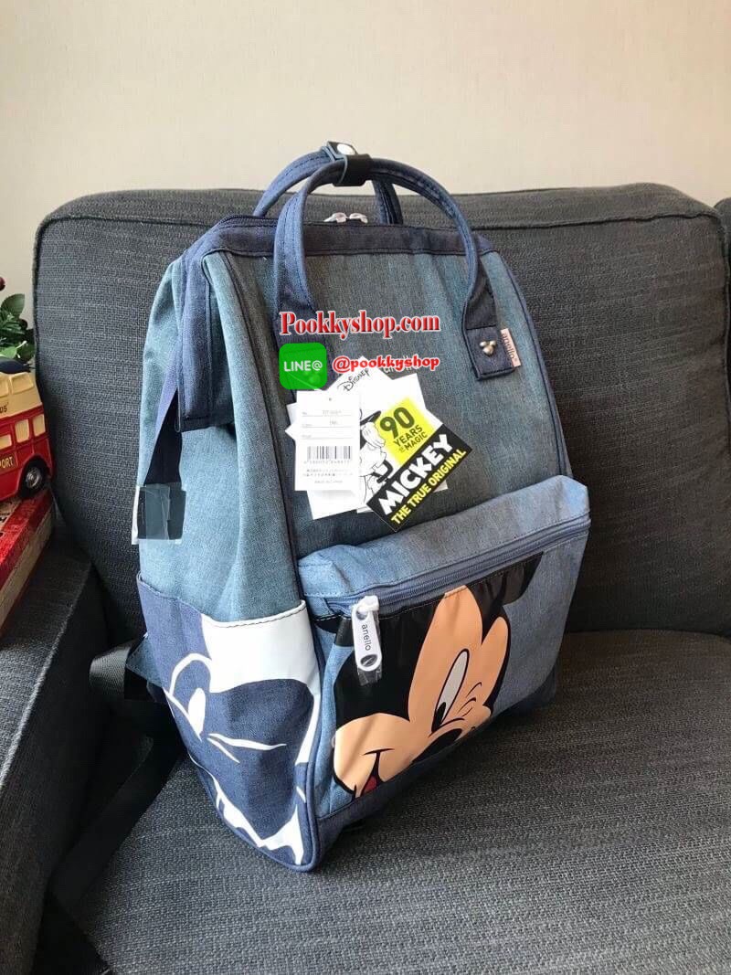 ANELLO MICKEY LIMITED EDITION DT-G001รุ่น Classic เป็นการทำงานร่วมกันระหว่าง Anello กับDisneyอีกครั้ง ภายใต้ตัวการ์ตูนมิกกี้ คอลเลคชั่นพิเศษ กระเป๋าเป้สะพายหลัง วัสดุ polyester ที่มีความหนาแน่นสูงที่เป็นที่นิยม พิมพ์โลโก้Anelloสีขาวบนด้านบนหน้ากระเป๋า ให้