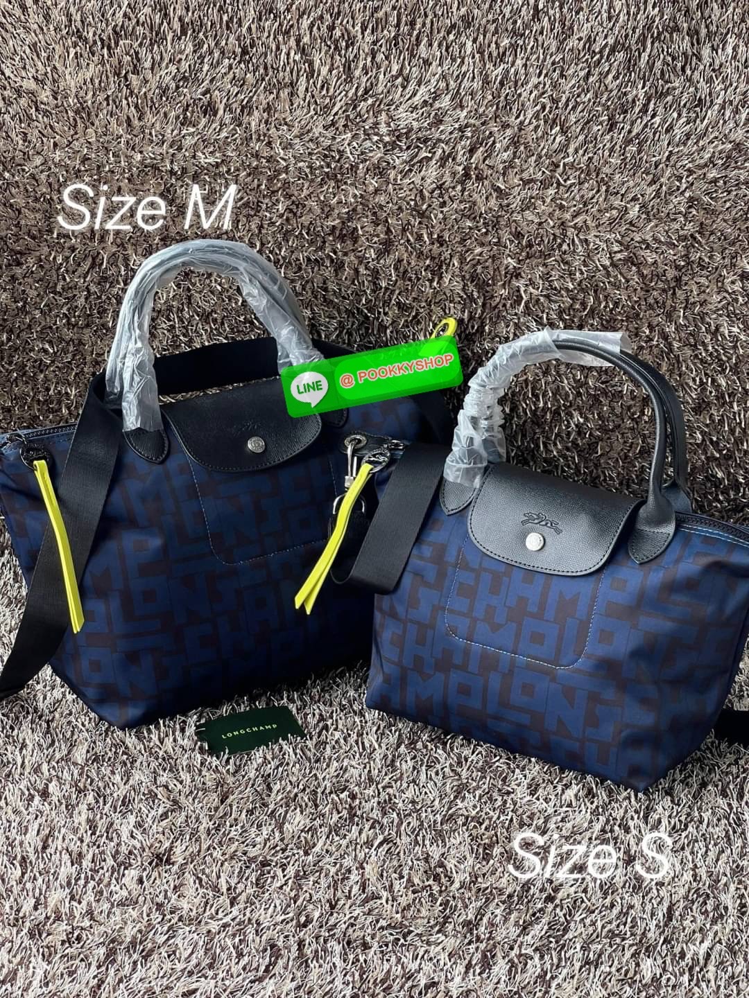💕Longchamp LE PLIAGE LGP TOP HANDLE BAG M พบกับคอลเลคชั่นใหม่ล่าสุด มีดีไซน์ที่เรียบหรูและคลาสสิก แฝงด้วยลูกเล่นแบบเฟมินีน แถมยังมีน้ำหนักเบาอย่างไม่น่าเชื่อ มาพร้อมกับหูจับกระเป๋าคู่และฝาปิดแบบกระดุม กระเป๋าถือใบนี้สามารถใช้ถือแบบทั่วไป มีสายสะพา