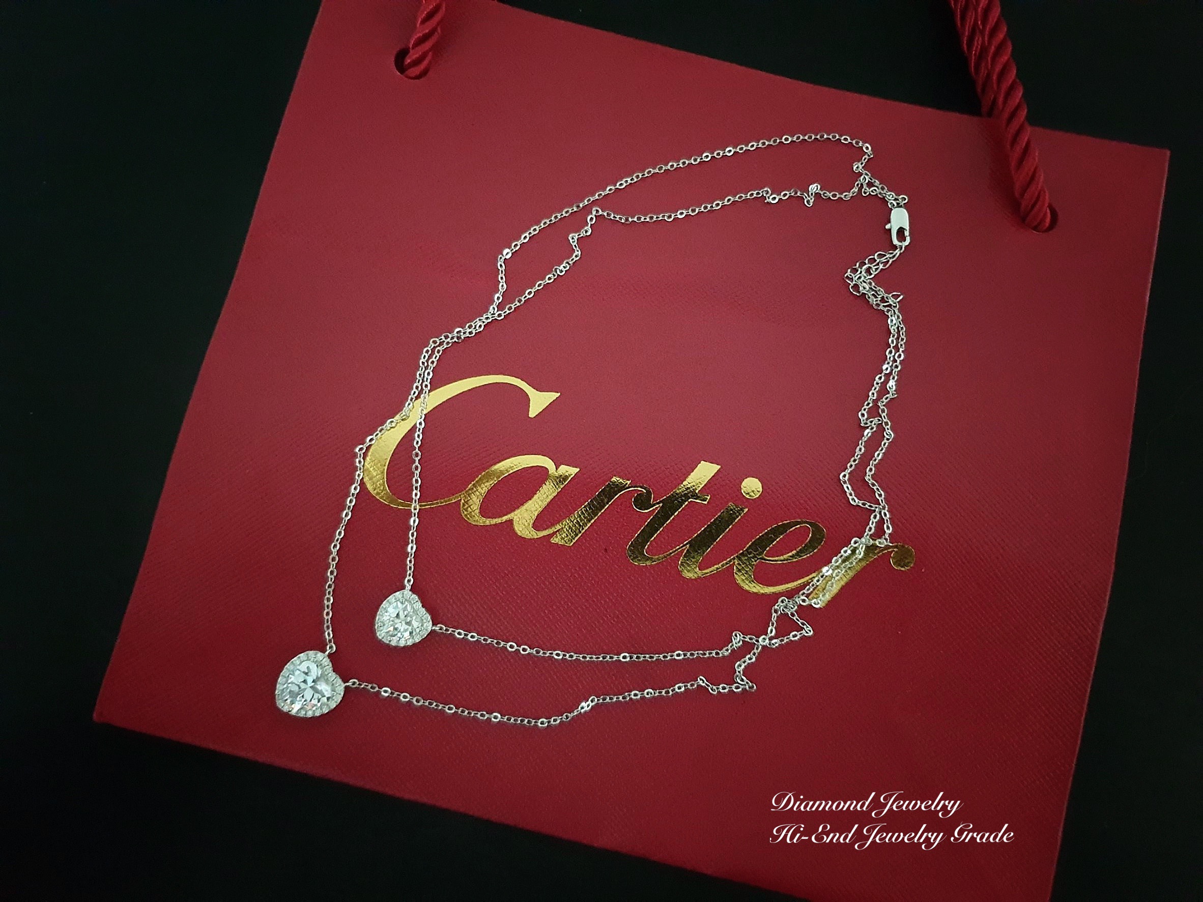 New Arrival !!!!!!! Cartier Love Diamond Necklace สร้อยคอเพชร CZ แท้ ดีไซส์หัวใจคู่น่าร๊าาาากกกก ที่สุดค่ะ ใส่ออกมาน่ารักมากๆๆๆๆๆพูดเลย งานหัวใจล้อมเพชร รุ่นนี้เพชรคัดเกรด 8AAA เหลี่ยมเยอะ อย่างดี เพชรเกรดดีที่สุด เพชรเล่นไฟแสบตาเลยค่ะ งานสั่งผลิตอย่างดี