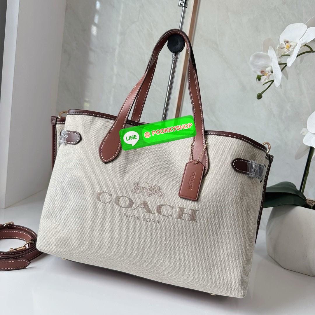 COACH HANNA CARRYALL WITH COACH CH189 IMNAM 🔖กระเป๋าสะพายไหล่/ถือ รูปทรงสวยหรู ลุคคุณนายมากแม่ 🔖วัสดุ: ผ้าแคนวาสตัดขอบหนัง 🔖เปิด-ปิดแบบกระดุมแม่เหล็ก ภายในกระเป๋ามัลติฟังก์ชั่น ช่องซิปกลาง บุผ้า 🔖สายสะพายถอดและปรับระดับได้