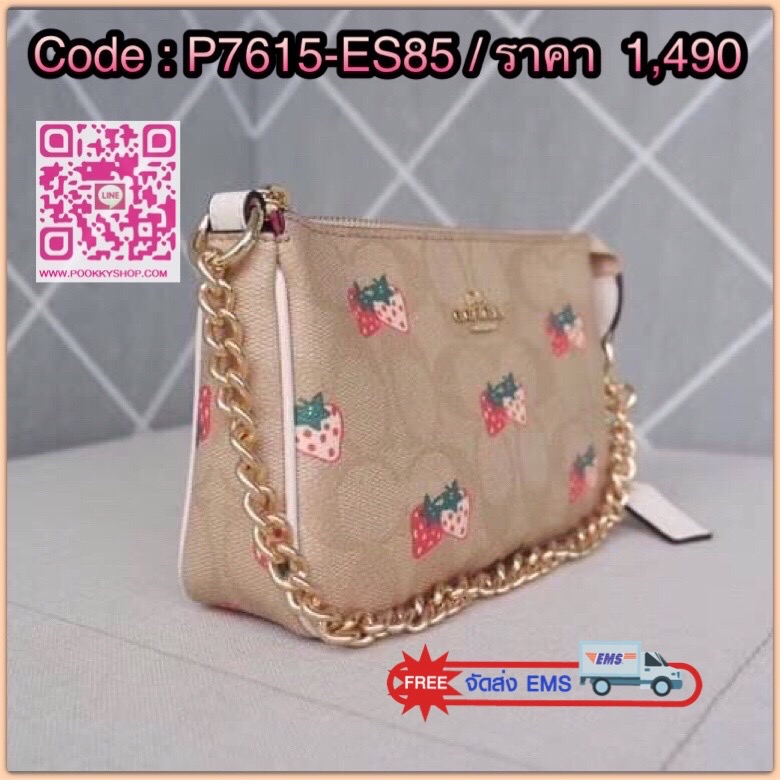 Coach POUCH IN SIGNATURE CANVAS WITH STRAWBERRY Signature coated canvas with smooth leather details Two credit card slots Inside multifunction pocket One zip closure, fabric lining| Detachable strap