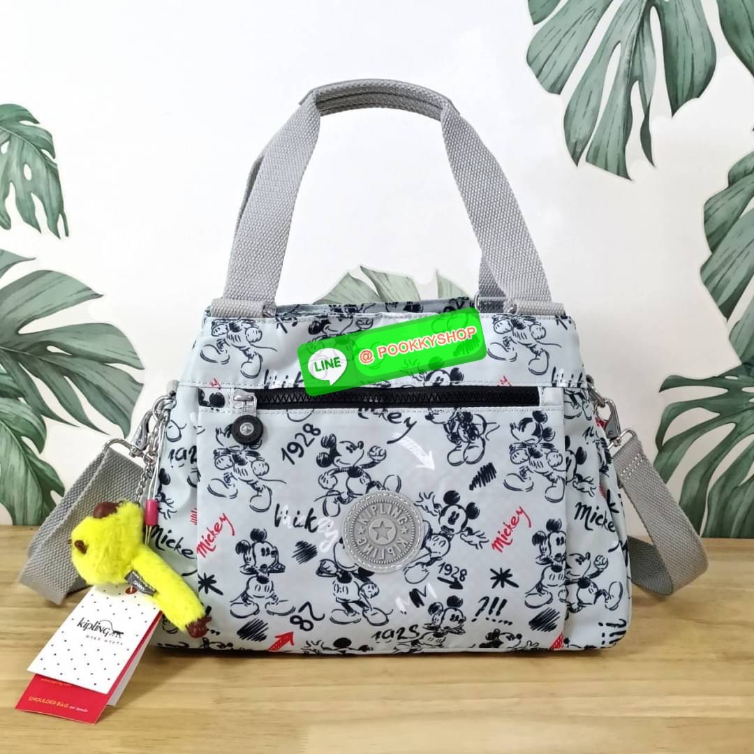 KIPLING ELISE HANDBAG กระเป๋าถือและสะพายไหล่ วัสดุ Nylon +Polyester ขนาดกำลังพอดี จุของได้มาก มีหูจับสองสาย ถือสะดวก น้ำหนักเบา มีช่องซิป ด้านหน้า ช่อง กระเป๋าหลักเปิด-ปิดด้วยซิป มี3 ช่องว่างใส่ของได้จุมากๆ ใส่มือถือได้ กระเป๋าสตางค์ใบยาว และ เครื่องสำอาง
