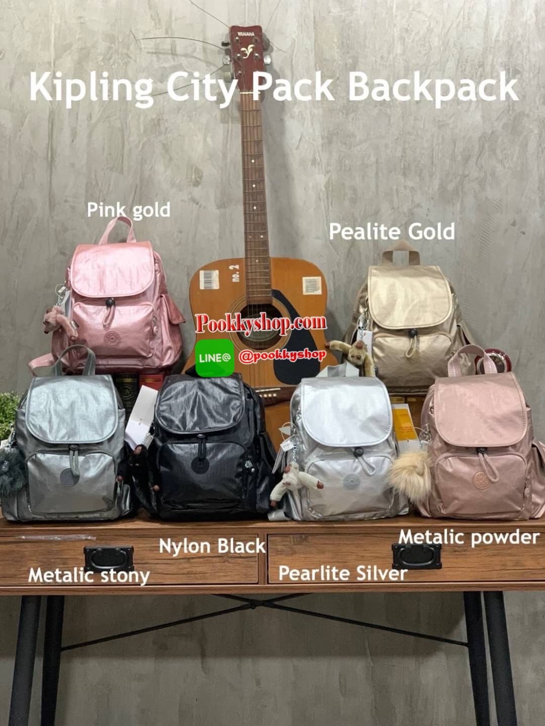 Kipling City Pack Backpack วัสดุPolyamide100% เป้ขนาดกลาง ที่เปิดปิดด้วยตัวล็อค2ชั้นด้วยกระดุมแม่เหล็กและซิป มีช่องใช้งานหลายช่องรวมถึงช่องซิปด้านหน้า มีลูกเล่นที่ด้านหลังมีช่องซิปสำหรับเก็บของและเก็บสายเป้ได้ หรือใช้สายจากเป้สะพายไหล่ได้ ประดับด้วยพวงกุญ