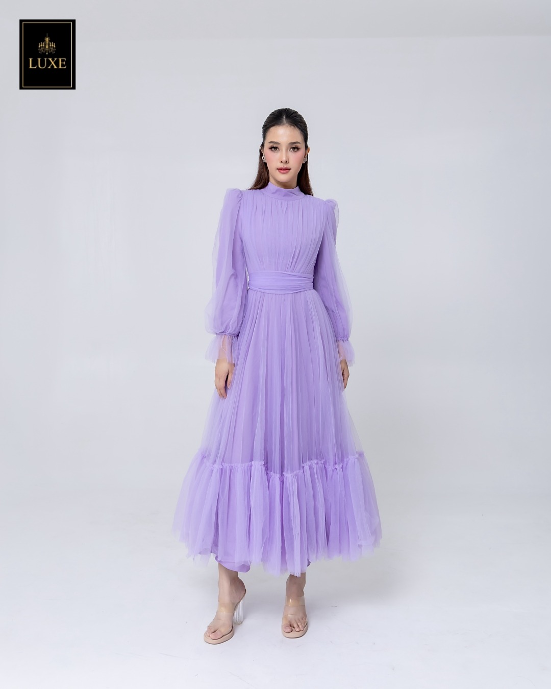 เดรสแฟชั่น แม็กซี่เดรสเสื้อคอปีนแขนยาว กระโปรงบานต่อชายรูดระบายรอบตัว มีโบว์ผูกเอว