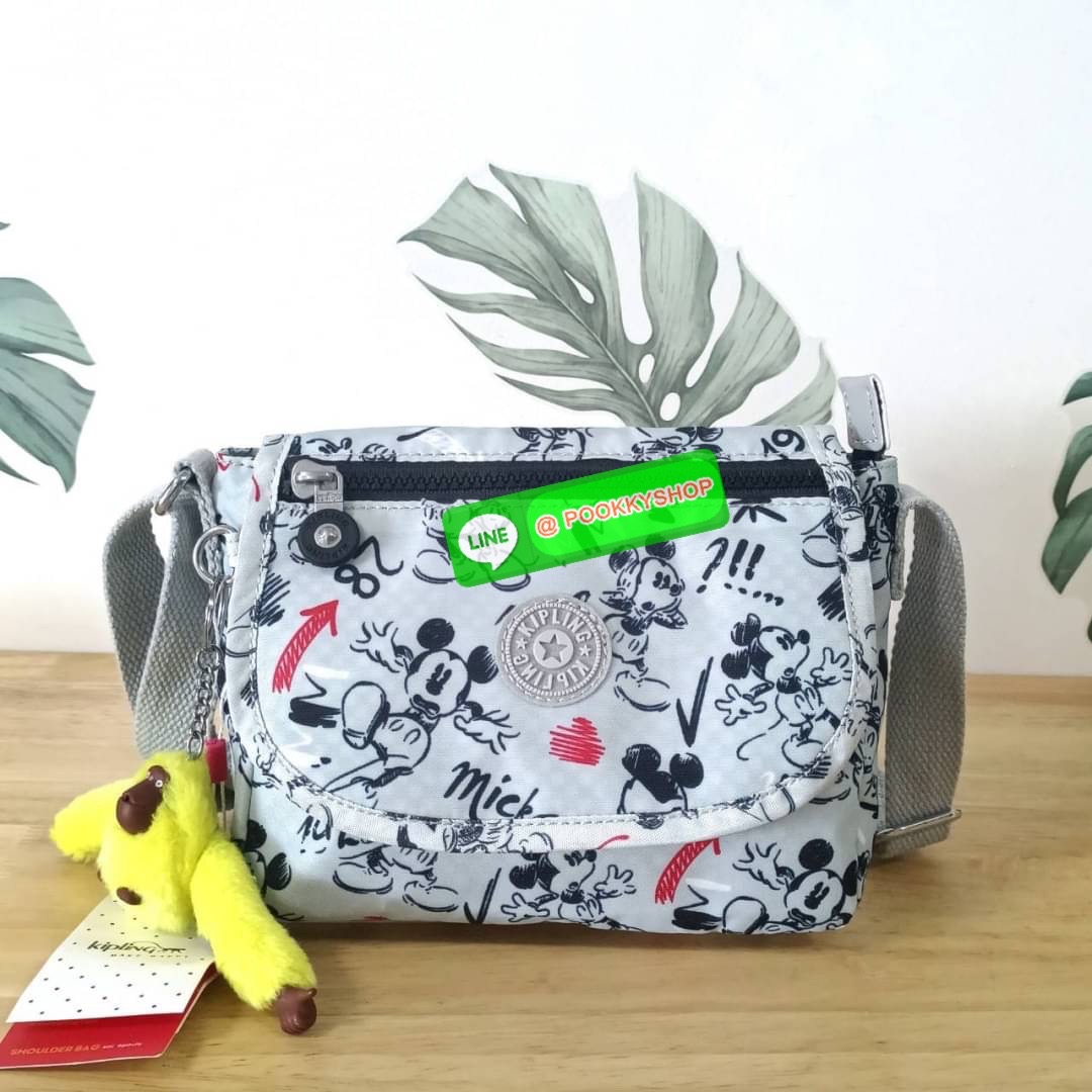 KIPLING SABIAN CROSSBODY MINI BAG กระเป๋าสะพายข้าง วัสดุ Nylon & Polyester 100% ขนาดเล็กกำลังน่ารัก เปิด-ปิดด้วยฝาปิดกระดุมแม่เหล็กและซิปแบรนด์ ด้านในทีแท็กแบรนด์