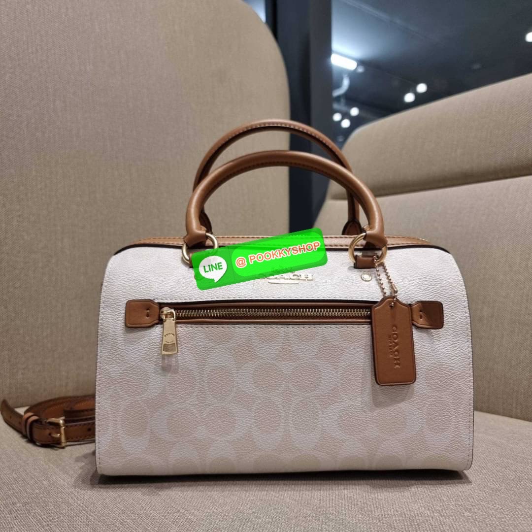 COACH CA149 ROWAN SATCHEL IN BLOCKED SIGNATURE CANVAS สีเข้าใหม่ตัวท็อปอีกหนึ่งรุ่น กับกระเป๋าทรงหมอน ดีไซน์คัลเลอร์บล็อค โทนสีตัดกันอย่างลงตัว ใช้งานง่าย ตอบโจทย์ทุกลุค ทุกสไตล์ มาพร้อมหูจับในตัว และสายครอสบอดี้ วัสดุหนังแคนวาสสลับหนังแท้ มีซิปด้านหน้า แ